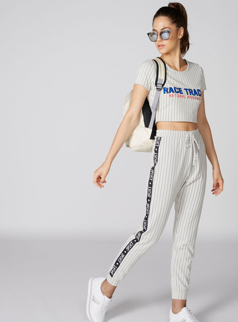 بنطال رياضي طويل ومقلم بشريطة جانبية ورباط-women-clothing-bottoms-joggers-image-1