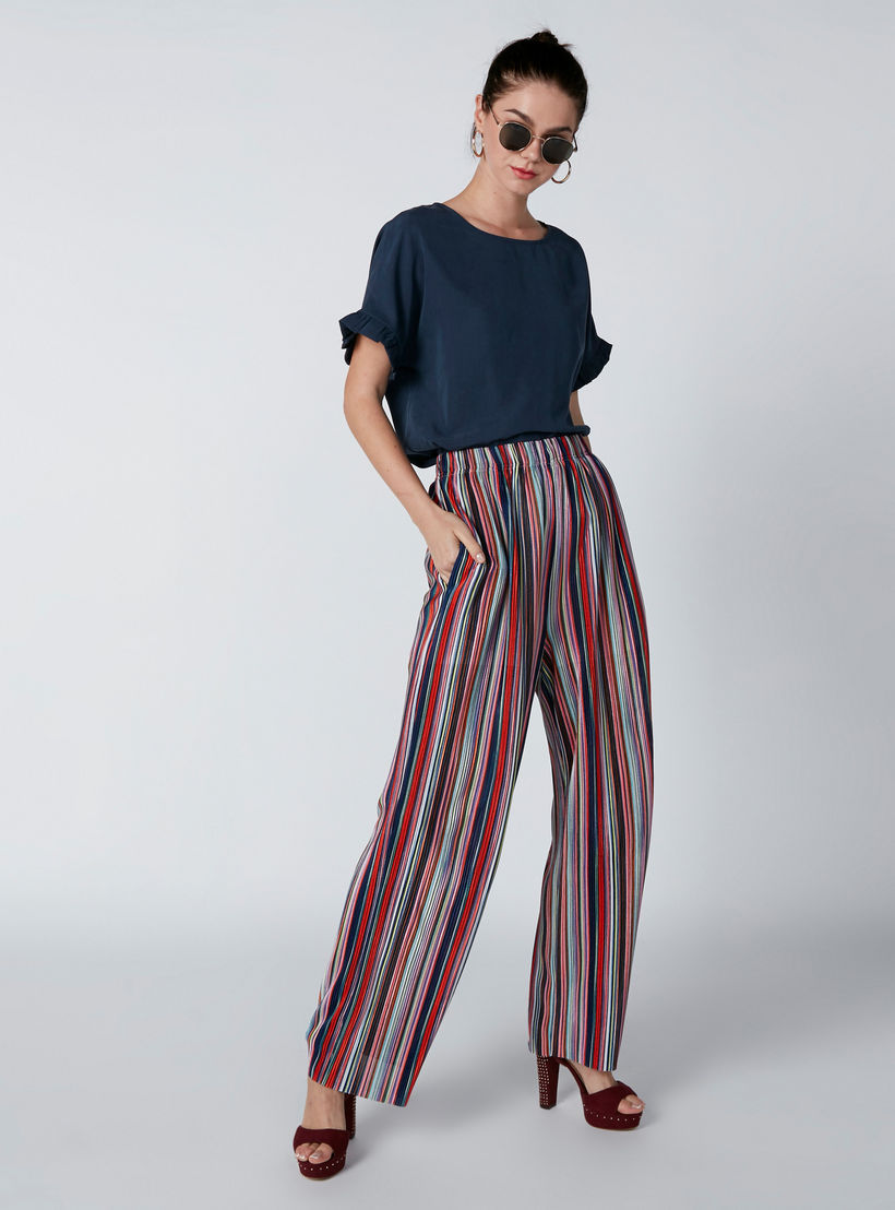 بنطال بالازو مقلّم بخصر مطّاطي وجيوب-women-clothing-bottoms-trousers-image-3