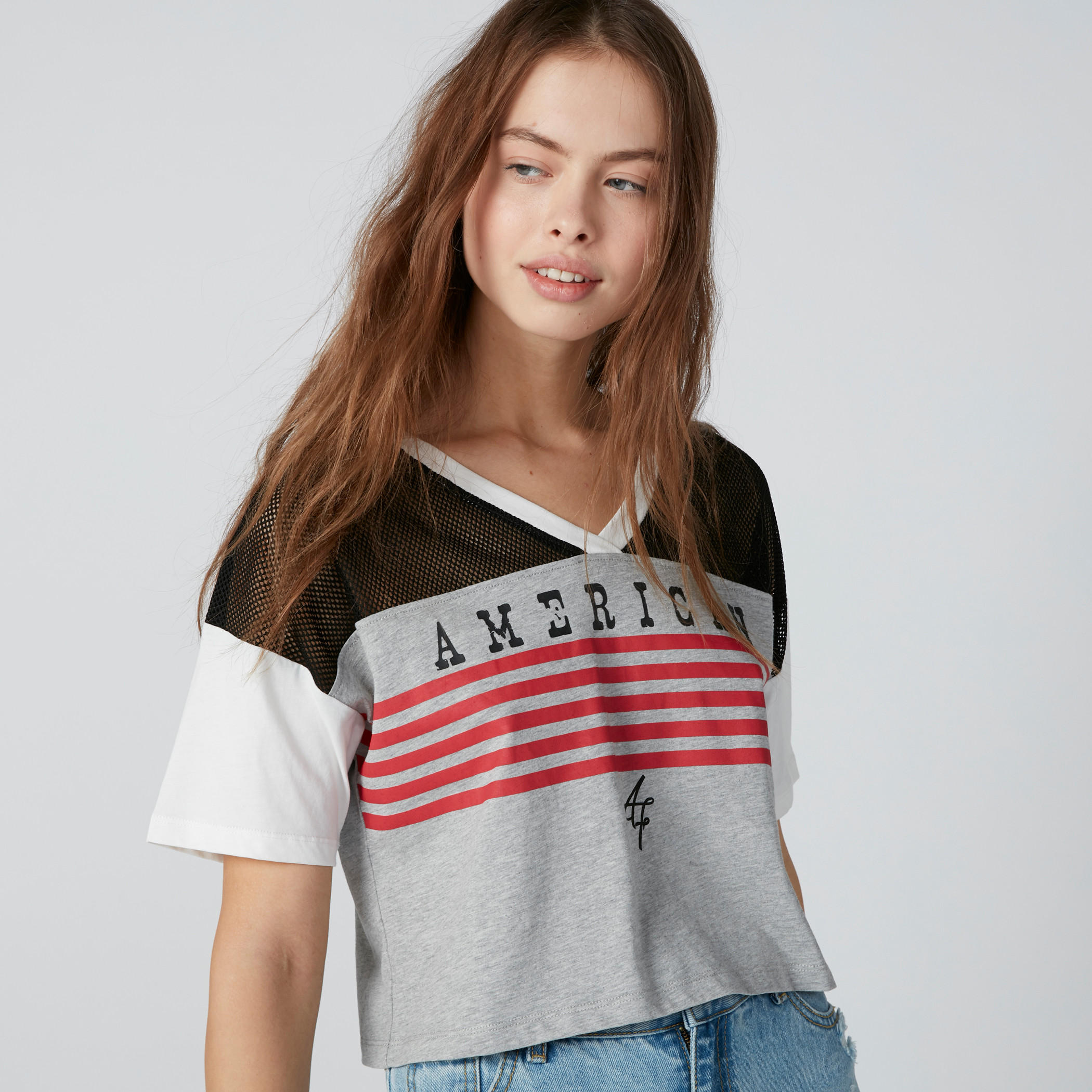 بلوزة بياقة V وأكتاف منسدلة وطبعات-women-clothing-tshirts-image-1