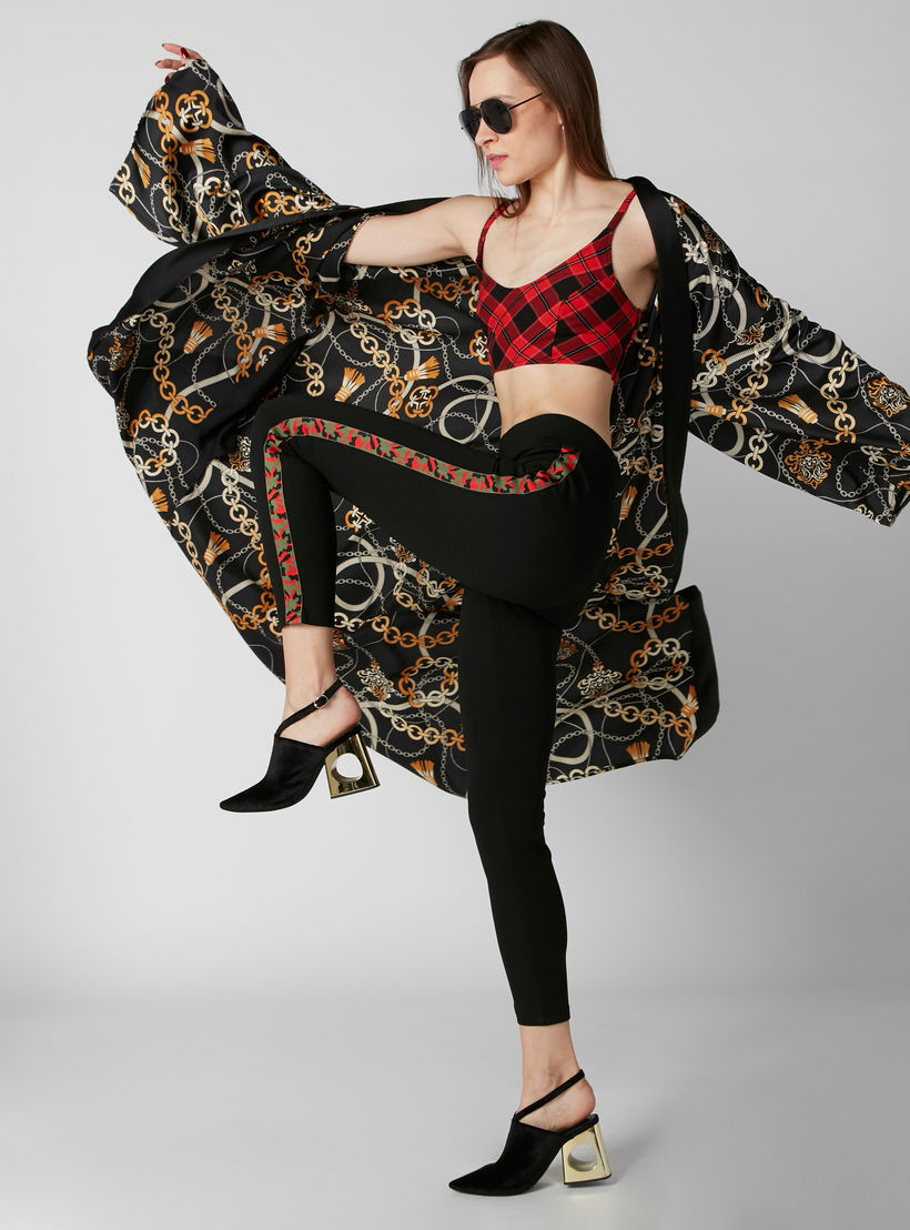 بنطال ليقنز بقصّة واسعة وخصر مرتفع وشريطة جانبية وطبعات-women-clothing-bottoms-leggings-image-1