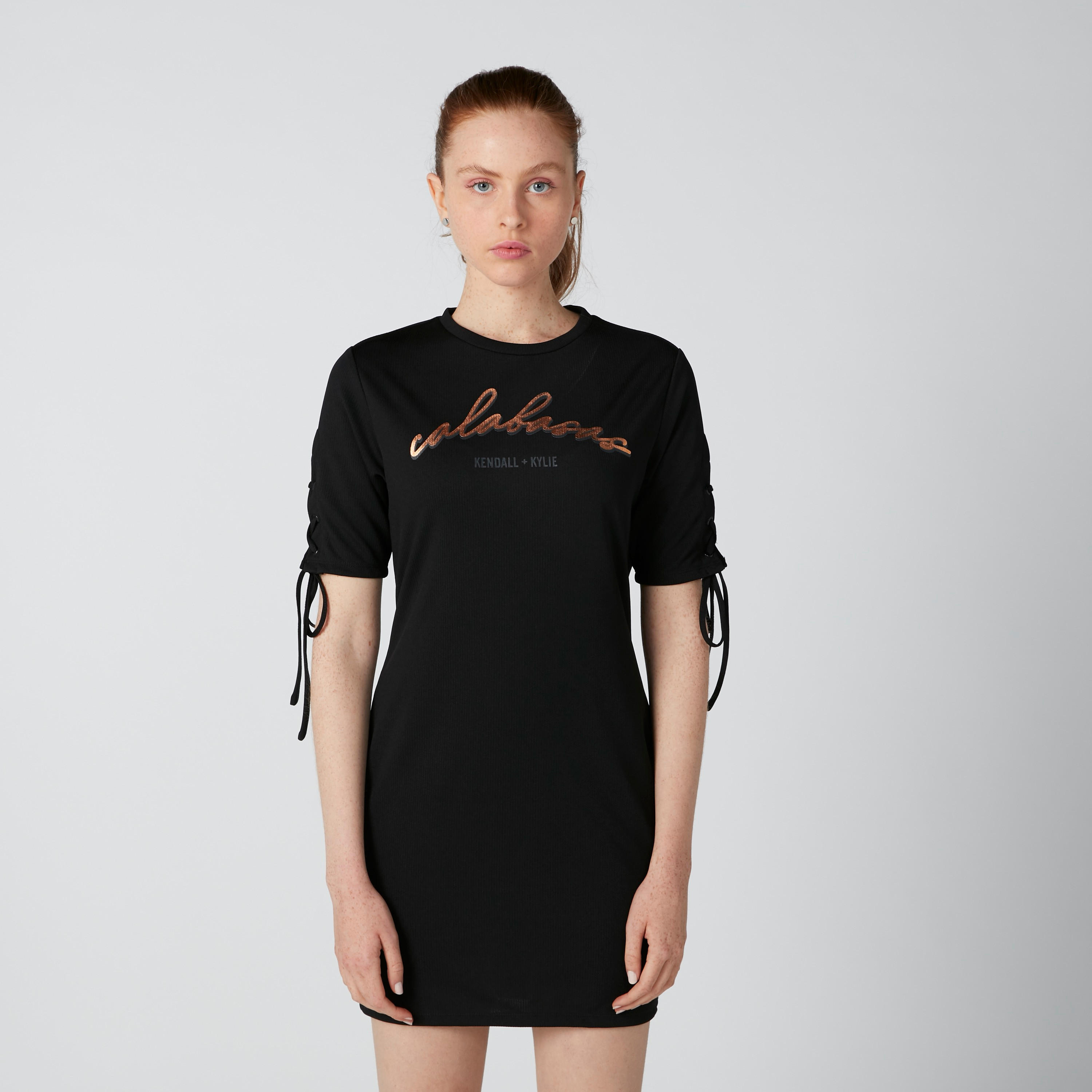 فستان بقصّة ضيّقة وأربطة وطبعات-women-clothing-dresses-image-5