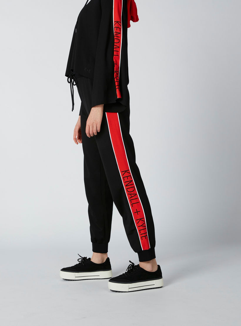 بنطال رياضي برباط وشريطة ودرزات-women-clothing-bottoms-joggers-image-1