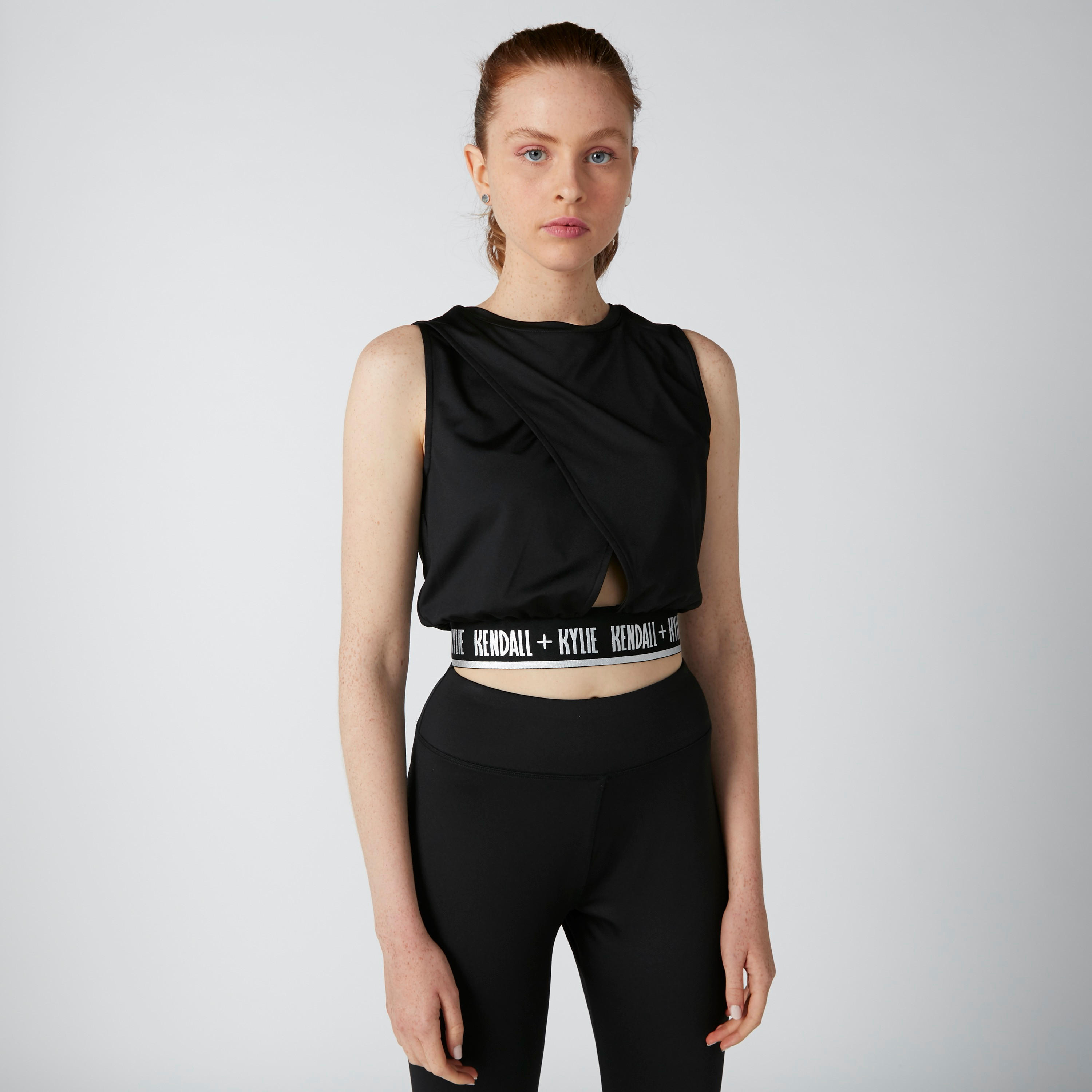بلوزة دون أكمام بياقة مستديرة وحوّاف بطبعات-women-clothing-tshirts-image-1