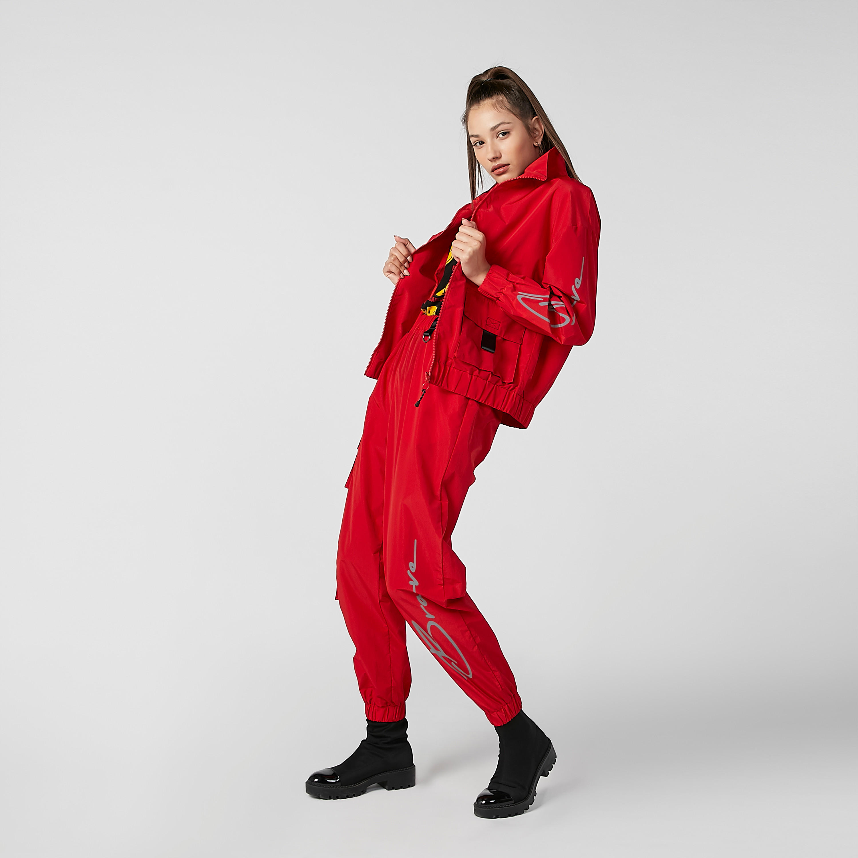 بنطلون رياضي سادة بخصر مطّاطي متوسط الارتفاع وجيوب-women-clothing-bottoms-trousers-image-2