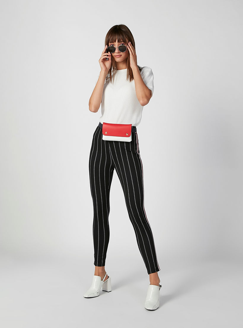 بنطلون سكيني مقلّم بشريطة-women-clothing-bottoms-trousers-image-4