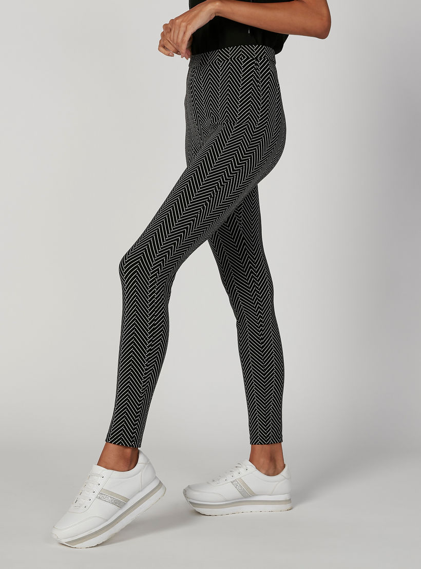 بنطلون جينز ضيّق سكيني بخصر مطّاطي متوسط الارتفاع وطبعات-women-clothing-bottoms-trousers-image-2