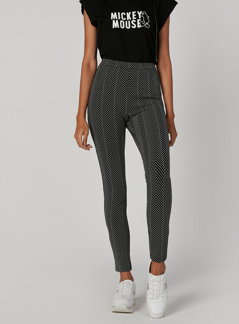 بنطلون جينز ضيّق سكيني بخصر مطّاطي متوسط الارتفاع وطبعات-women-clothing-bottoms-trousers-image-3