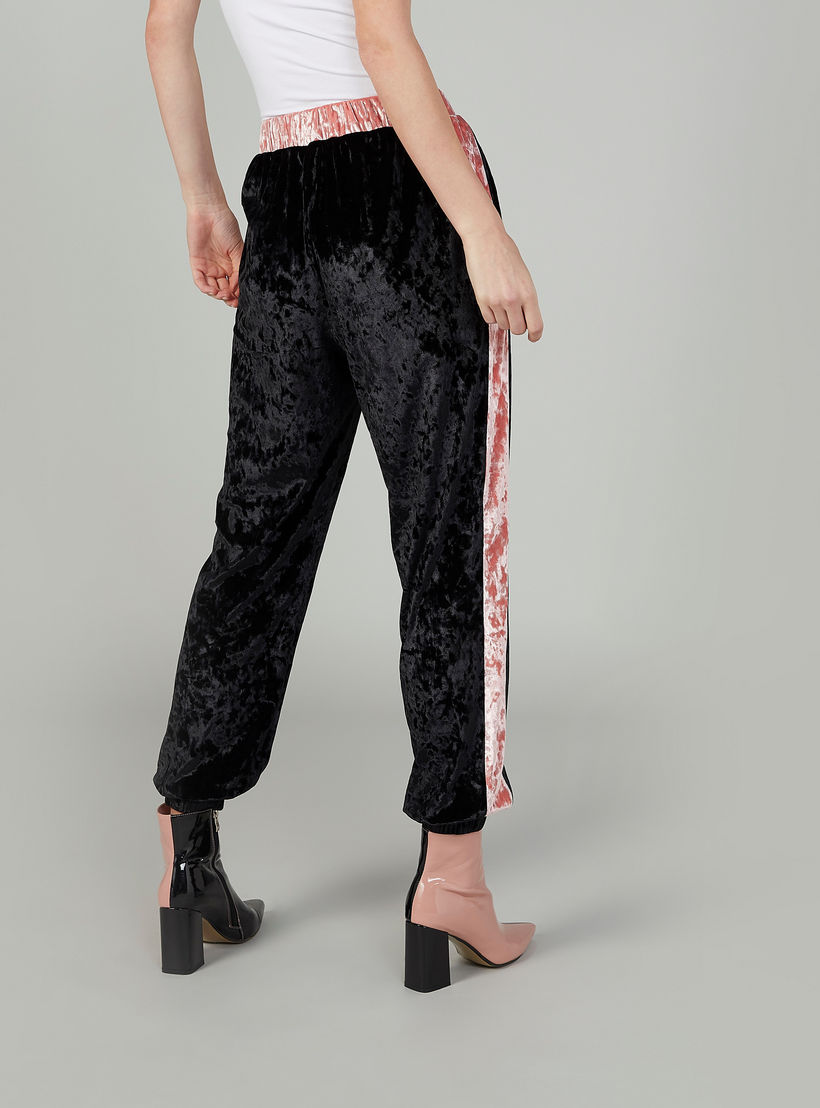 بنطلون رياضي بارز الملمس بخصر متوسط الارتفاع وجيوب ورباط-women-clothing-bottoms-joggers-image-4