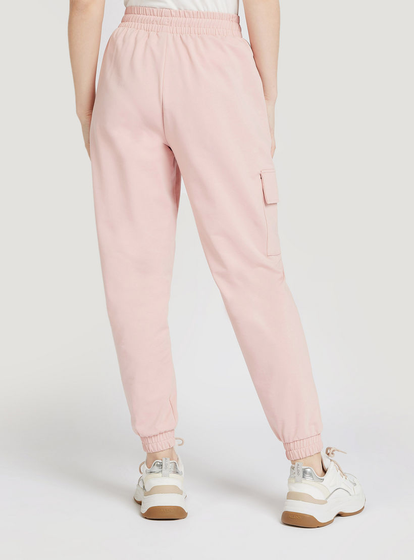 بنطلون رياضي سادة بجيوب وخصر مطّاطي-women-clothing-bottoms-joggers-image-1
