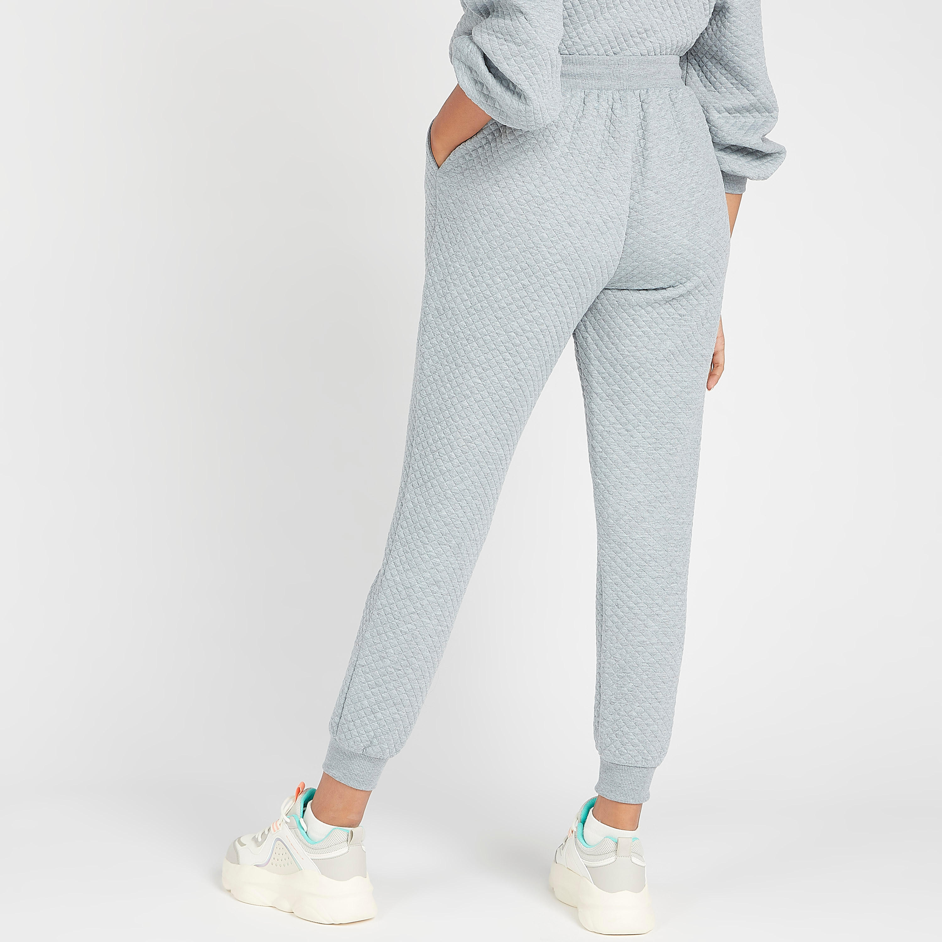 بنطلون رياضي مبطن بخصر متوسط الارتفاع وجيوب ورباط إغلاق-women-clothing-bottoms-joggers-image-4