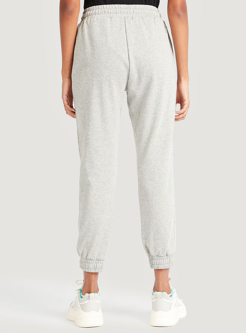بنطلون رياضي سادة بقصة سليم ورباط إغلاق-women-clothing-bottoms-joggers-image-2