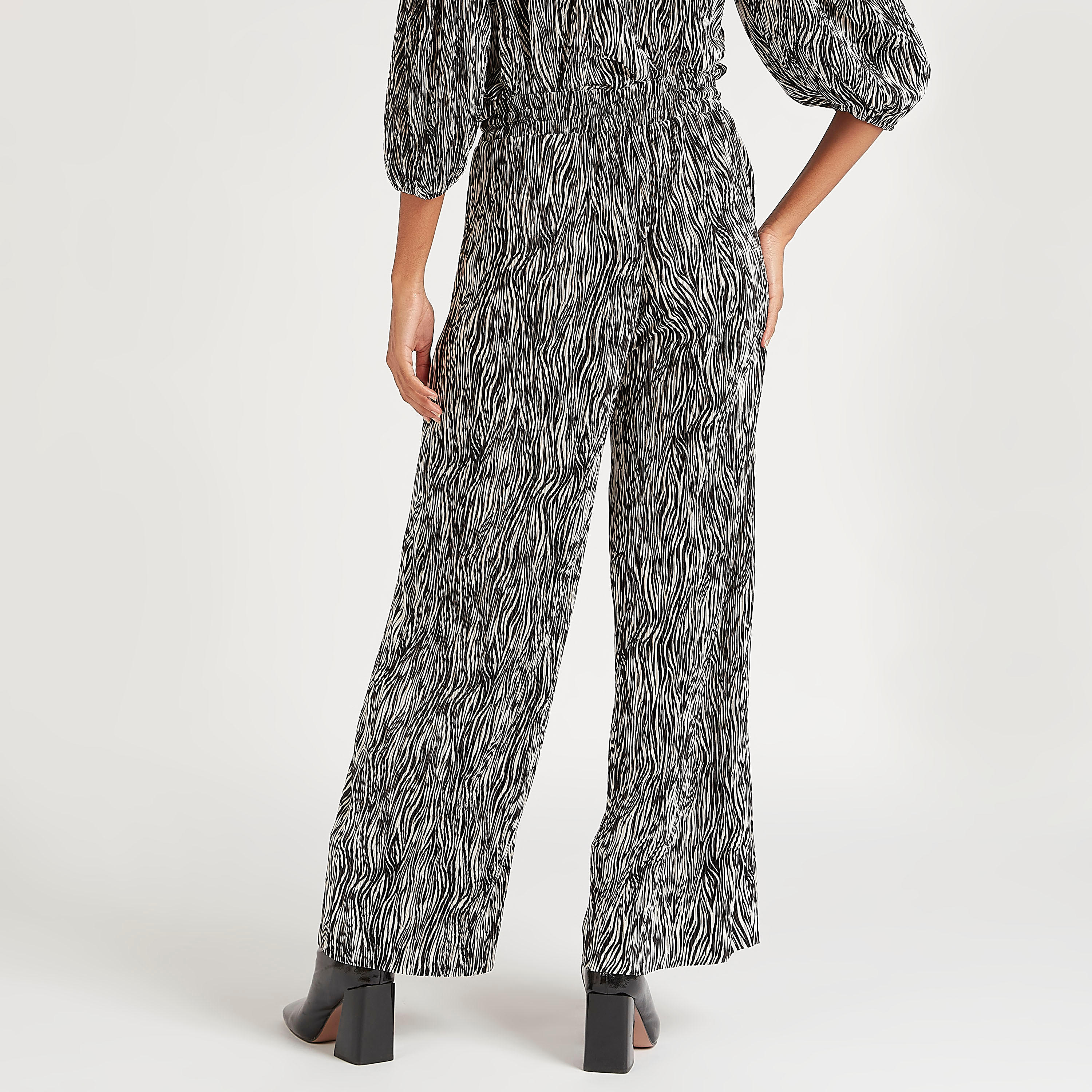 بنطلون بطبعات حيوانات وخصر مطّاطي متوسّط الارتفاع وجيوب-women-clothing-bottoms-trousers-image-4