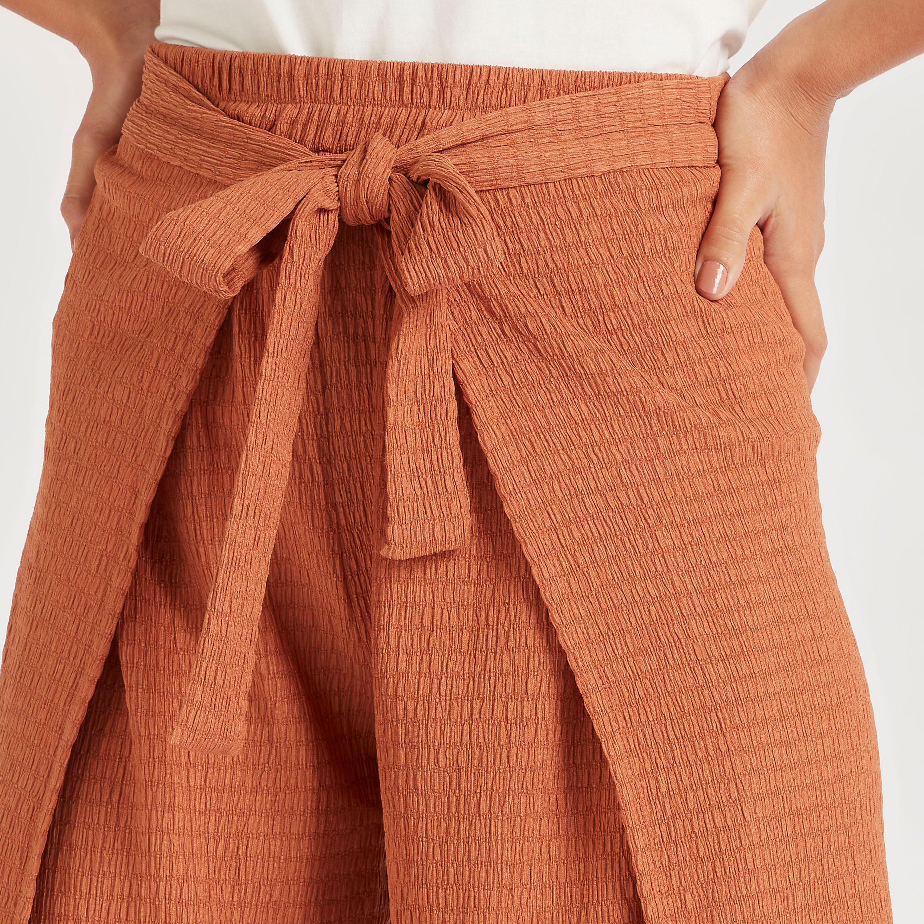 بنطلون بالازو بارز الملمس بتصميم ملفوف بخصر متوسط الارتفاع وأربطة-women-clothing-bottoms-trousers-image-3