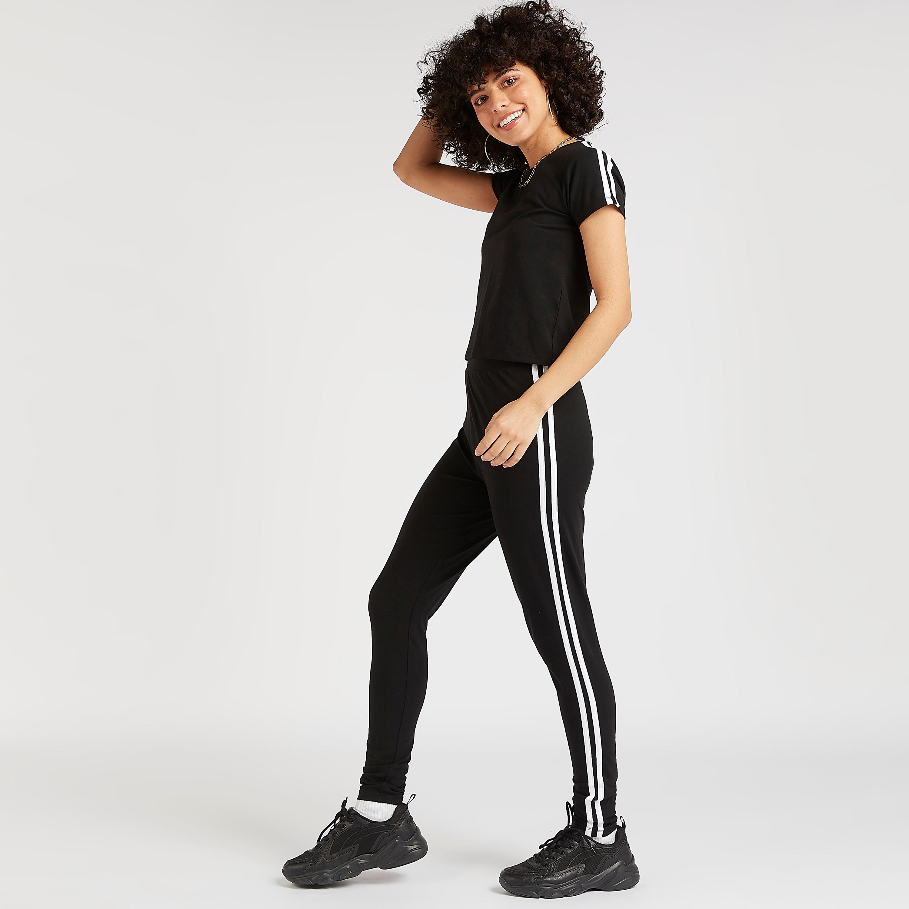 بنطلون ليقنز مقلّم بخصر مطّاطي متوسط الارتفاع-women-clothing-bottoms-leggings-image-2