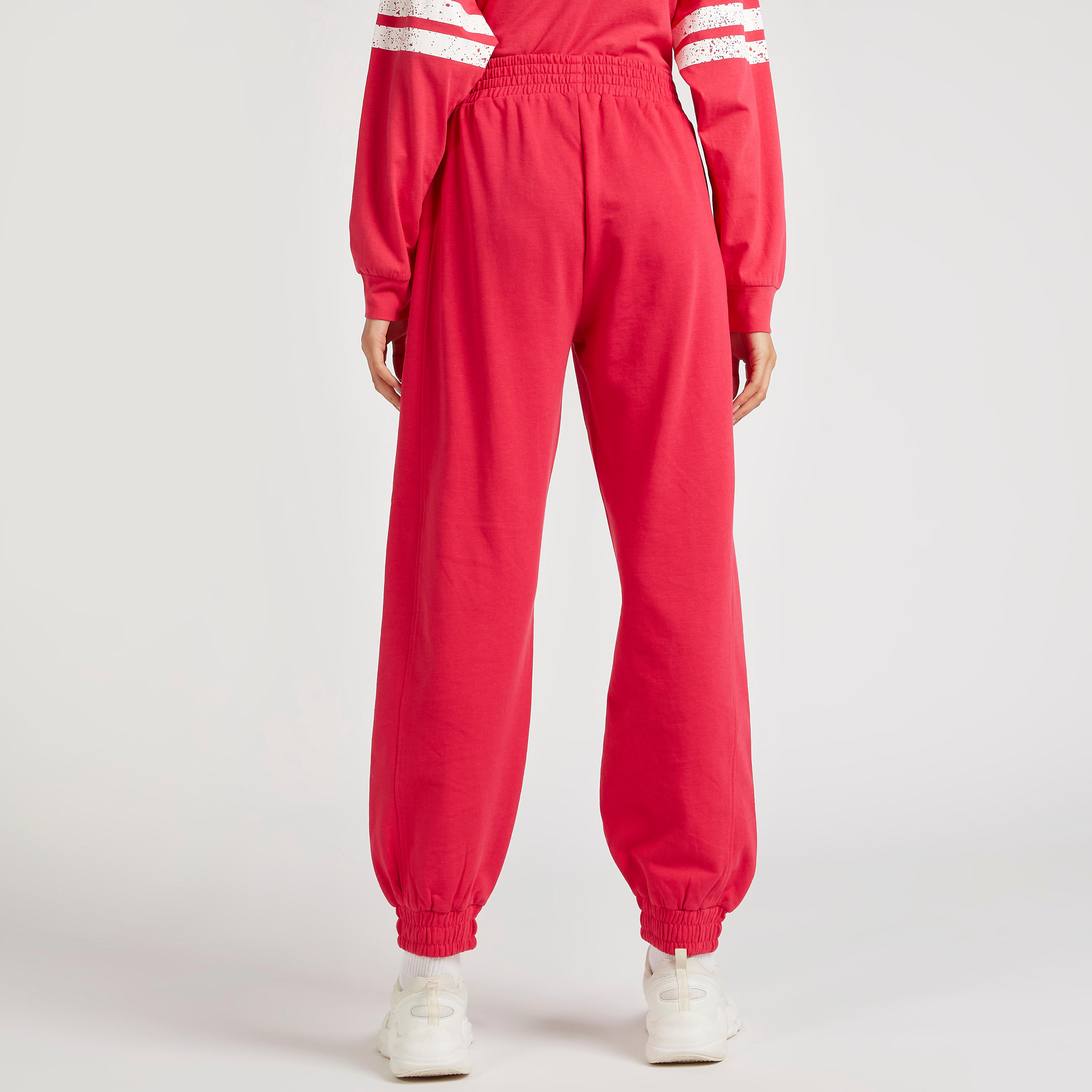 بنطلون رياضي واسع بطبعات وخصر مطّاطي وجيوب-women-clothing-bottoms-joggers-image-4