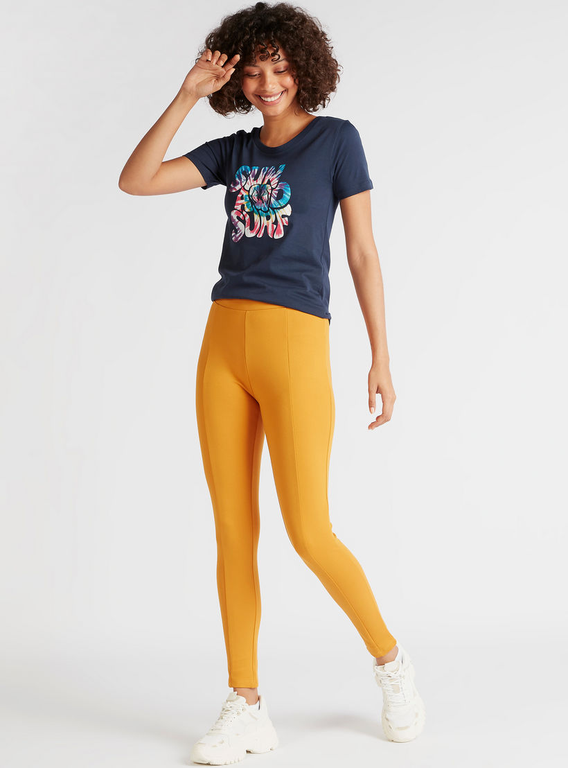 بنطلون ليقنز سادة بقصة سليم وخصر مرتفع مطّاطي-women-clothing-leggings-image-2