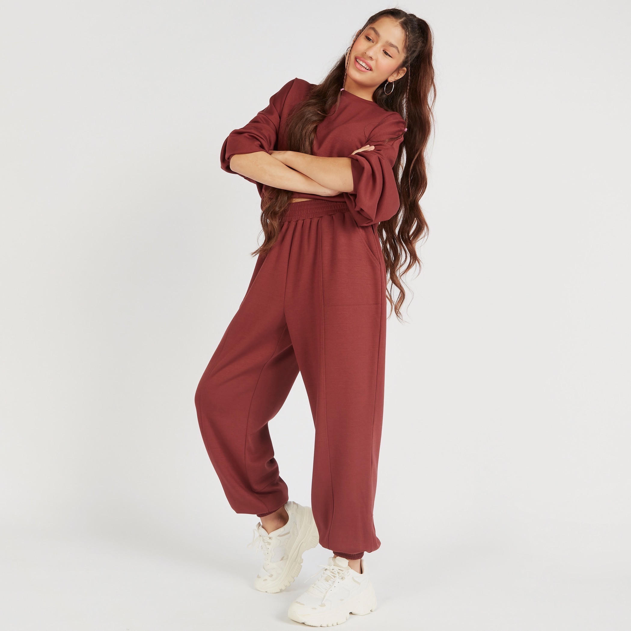 بنطلون رياضي سادة بخصر مطّاطي متوسّط الارتفاع وجيوب-women-clothing-bottoms-joggers-image-1