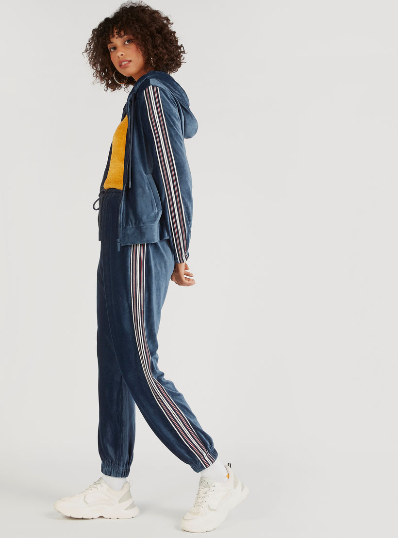 بنطلون رياضي بارز الملمس بخصر متوسّط الارتفاع ورباط إغلاق وجيوب-women-clothing-bottoms-joggers-image-2