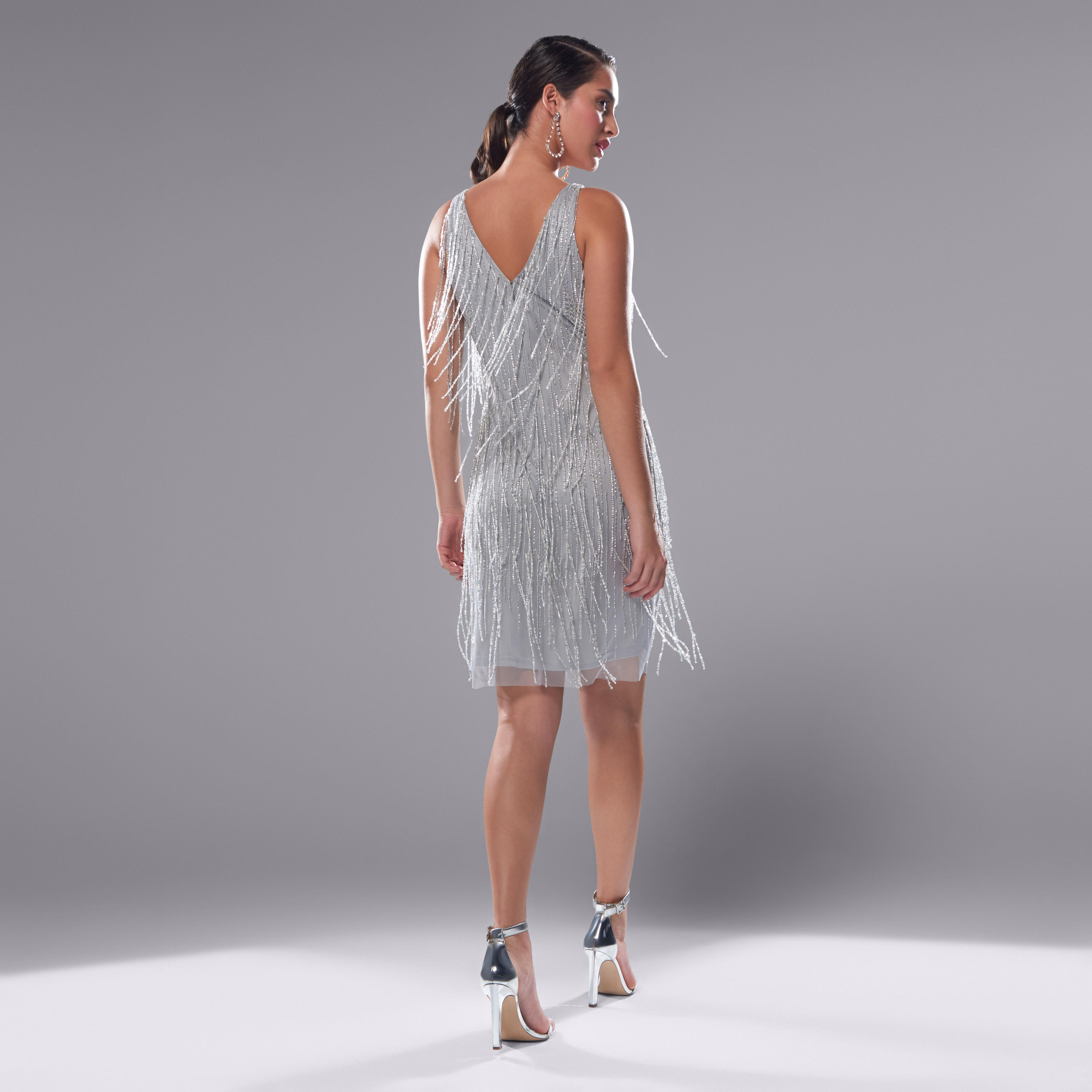 فستان واسع دون أكمام مزين بياقة V-women-clothing-dresses-image-3