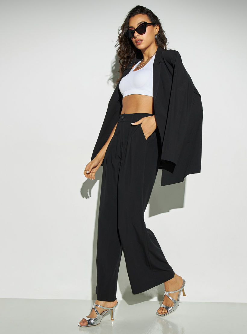 بنطلون سادة بقصة مريحة وجيوب وزر إغلاق-women-clothing-bottoms-trousers-image-3