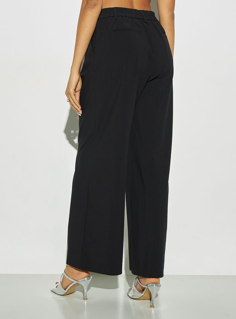 بنطلون سادة بقصة مريحة وجيوب وزر إغلاق-women-clothing-bottoms-trousers-image-2