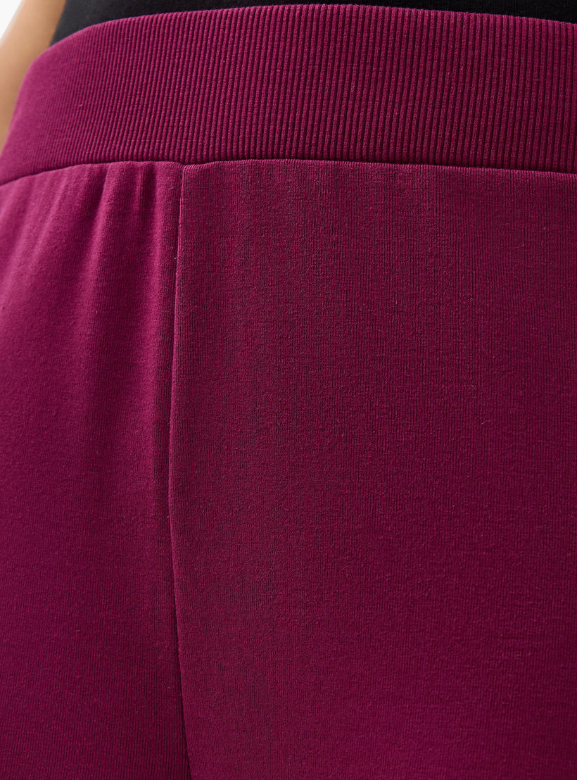 بنطلون ليقنز واسع سادة بخصر مطاطي -women-clothing-bottoms-leggings-image-1
