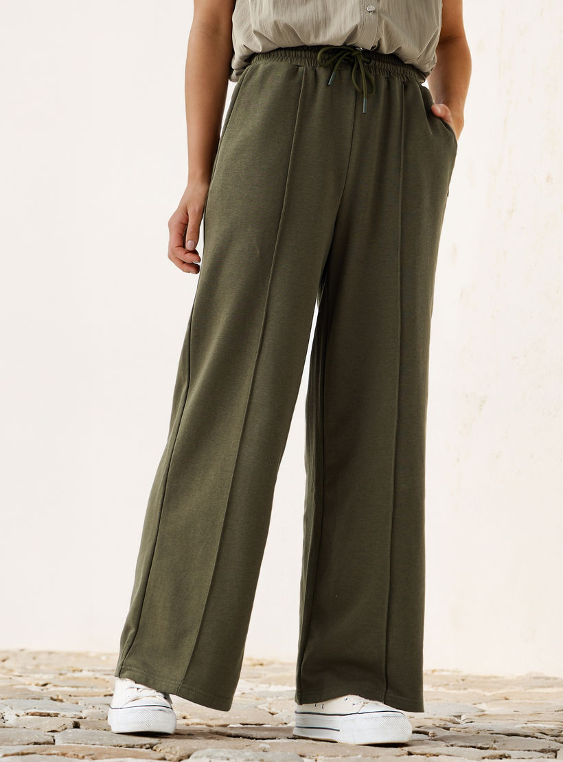 بنطلون بقصة عادية وخصر مرن وجيوب-women-clothing-bottoms-joggers-image-1