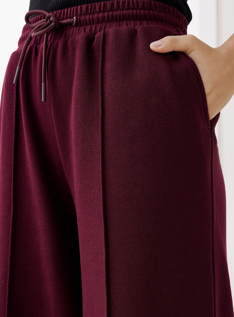 بنطلون بقصة عادية وخصر مرن وجيوب-women-clothing-bottoms-joggers-image-4