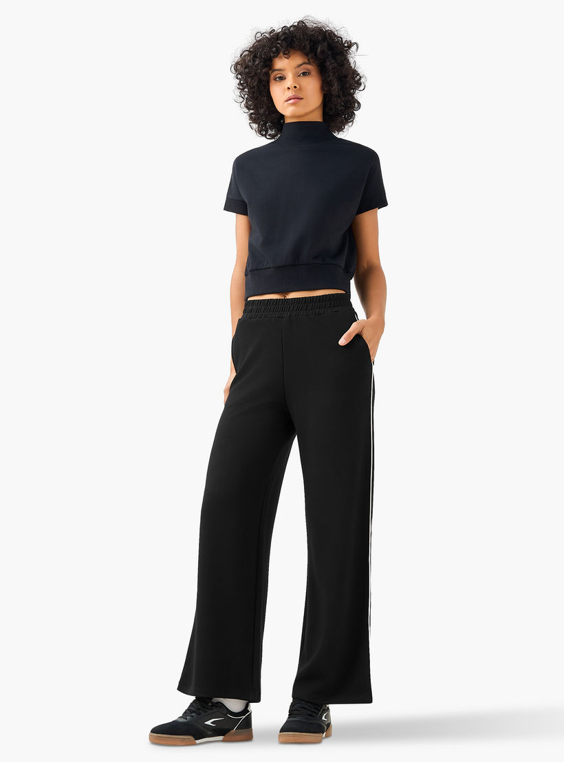 بنطلون بقصة عادية وخصر متوسط بتصميم خطوط بارزة-women-clothing-coordsets-image-2