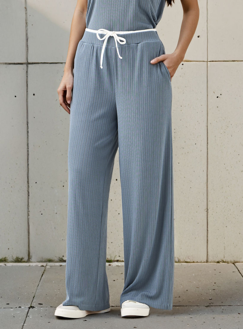 بنطلون رياضي واسع الساقين مضلّع بخصر مطاطي متباين متوسط الارتفاع -women-clothing-bottoms-joggers-image-1