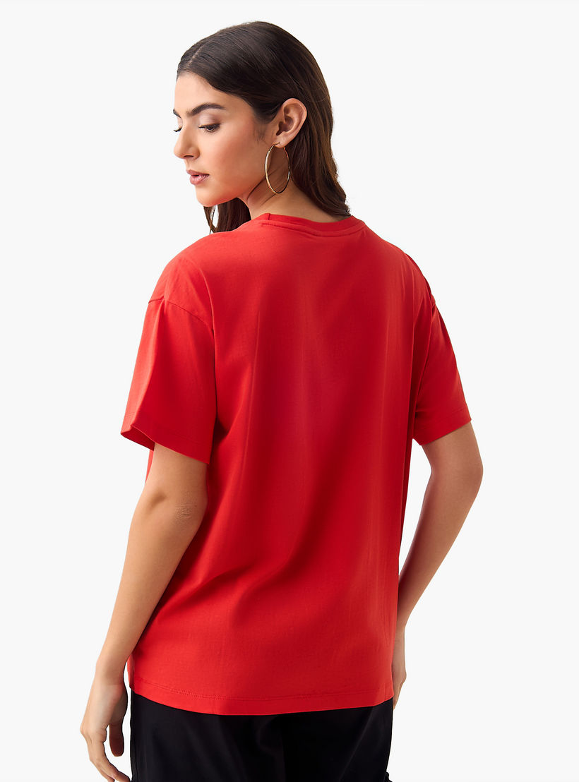 تيشيرت قطن واسع بطبعات شعار-women-clothing-tshirts-image-4