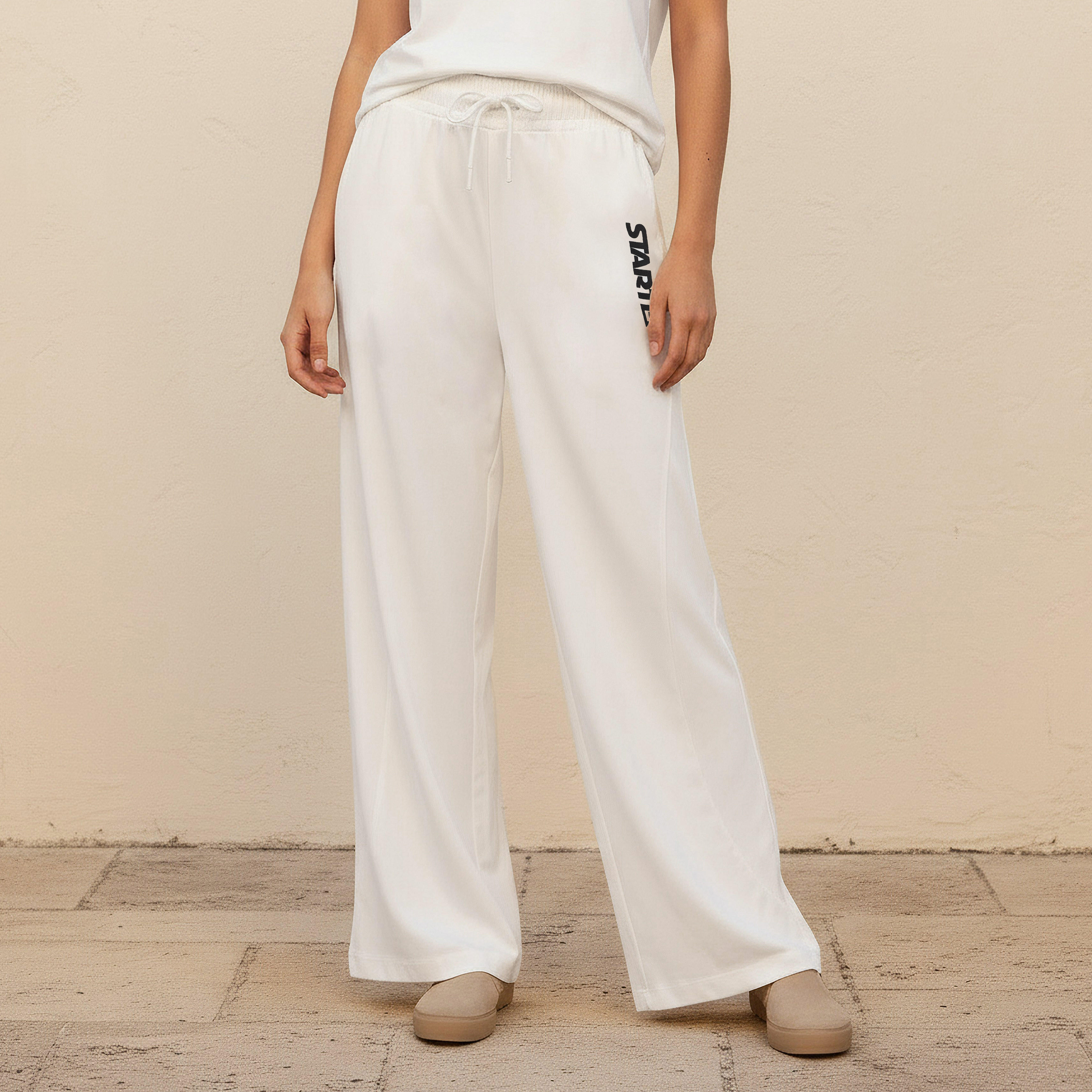 بنطلون رياضي واسع الساقين بخصر متوسط الارتفاع وطبعات-women-clothing-bottoms-joggers-image-1