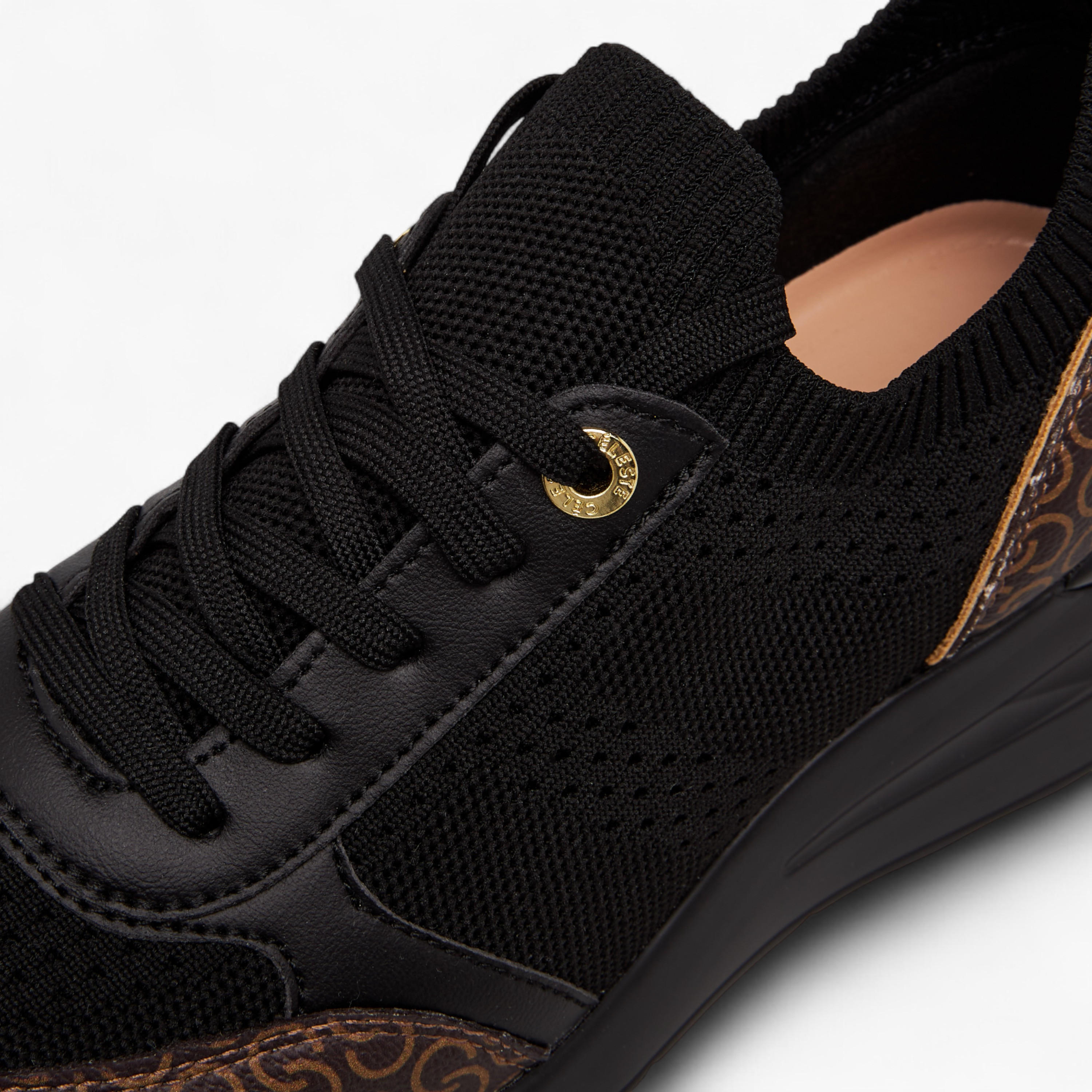 حذاء سنيكرز برباط إغلاق وطبعات مونوجرام وكعب ويدج للنساء من سيليست-women-shoes-sneakers-image-9