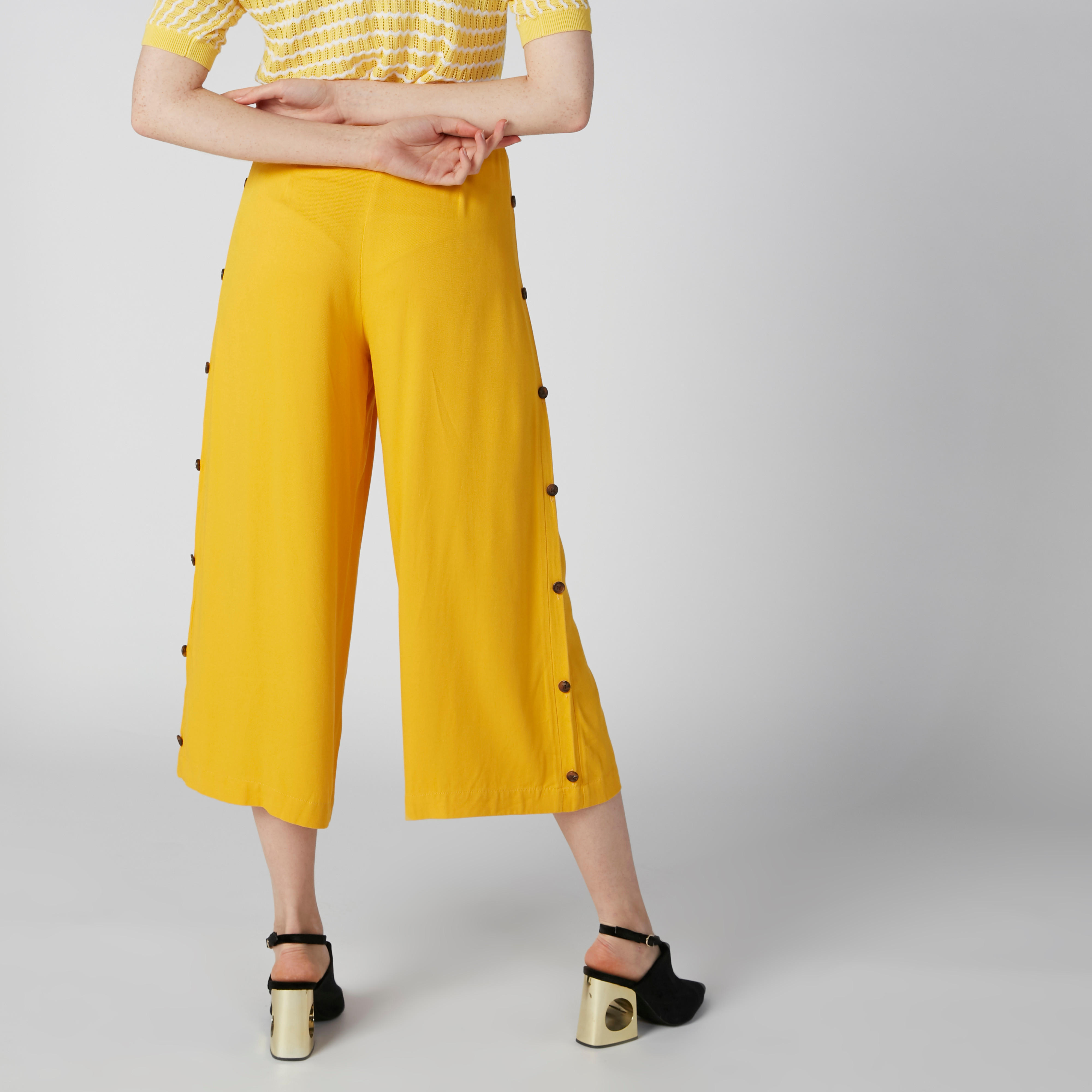 بنطال واسع الساقين بقصّة واسعة وخصر متوسط الارتفاع وأزرار من إيل-women-clothing-bottoms-trousers-image-2