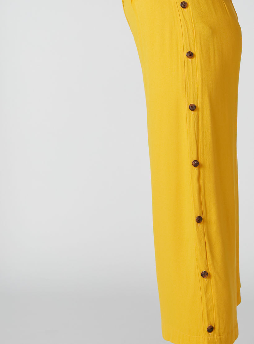 بنطال واسع الساقين بقصّة واسعة وخصر متوسط الارتفاع وأزرار من إيل-women-clothing-bottoms-trousers-image-5
