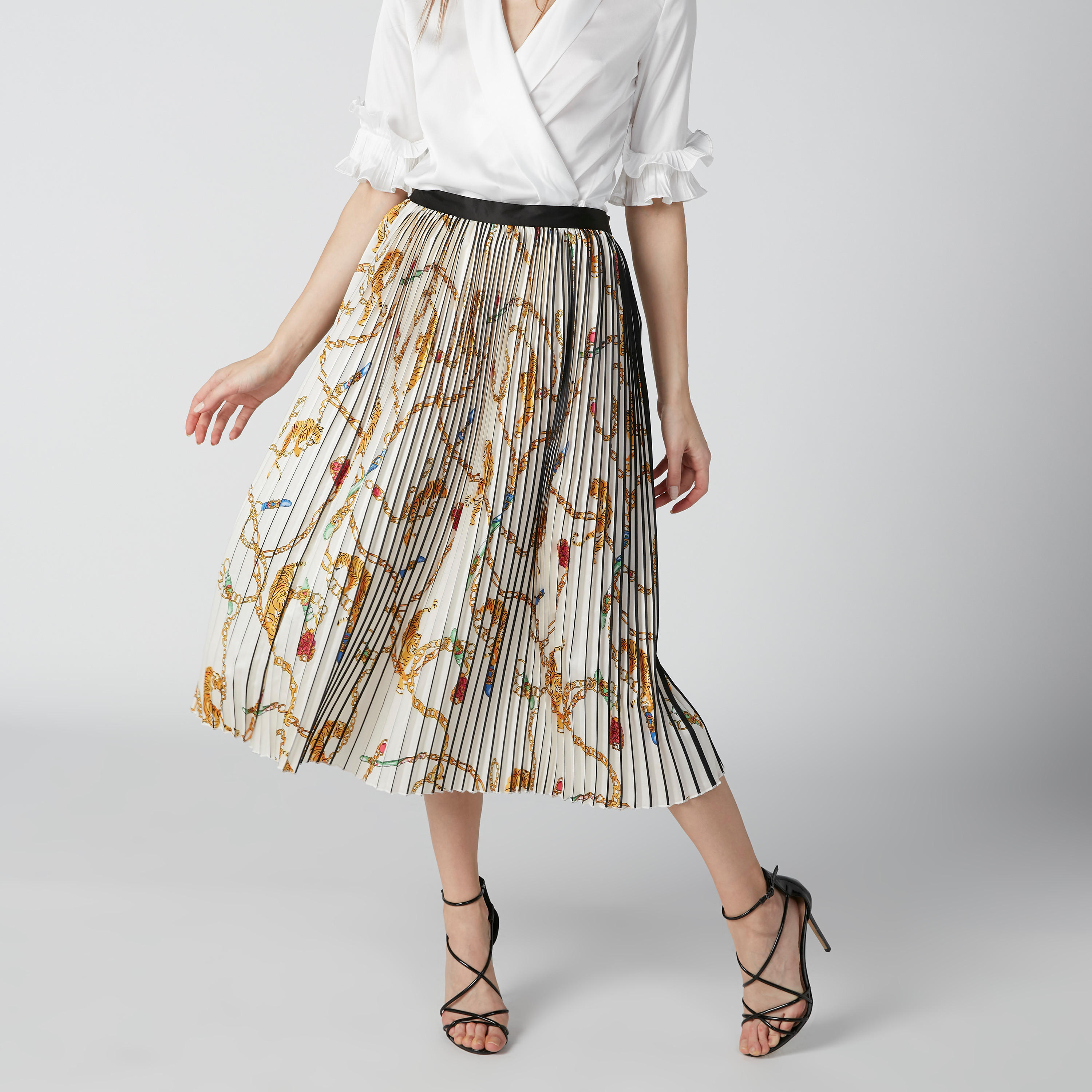 تنورة إيه لاين متوسطة الطول بخصر مطّاطي وثنيات وطبعات من إيل-women-clothing-bottoms-skirts-image-3