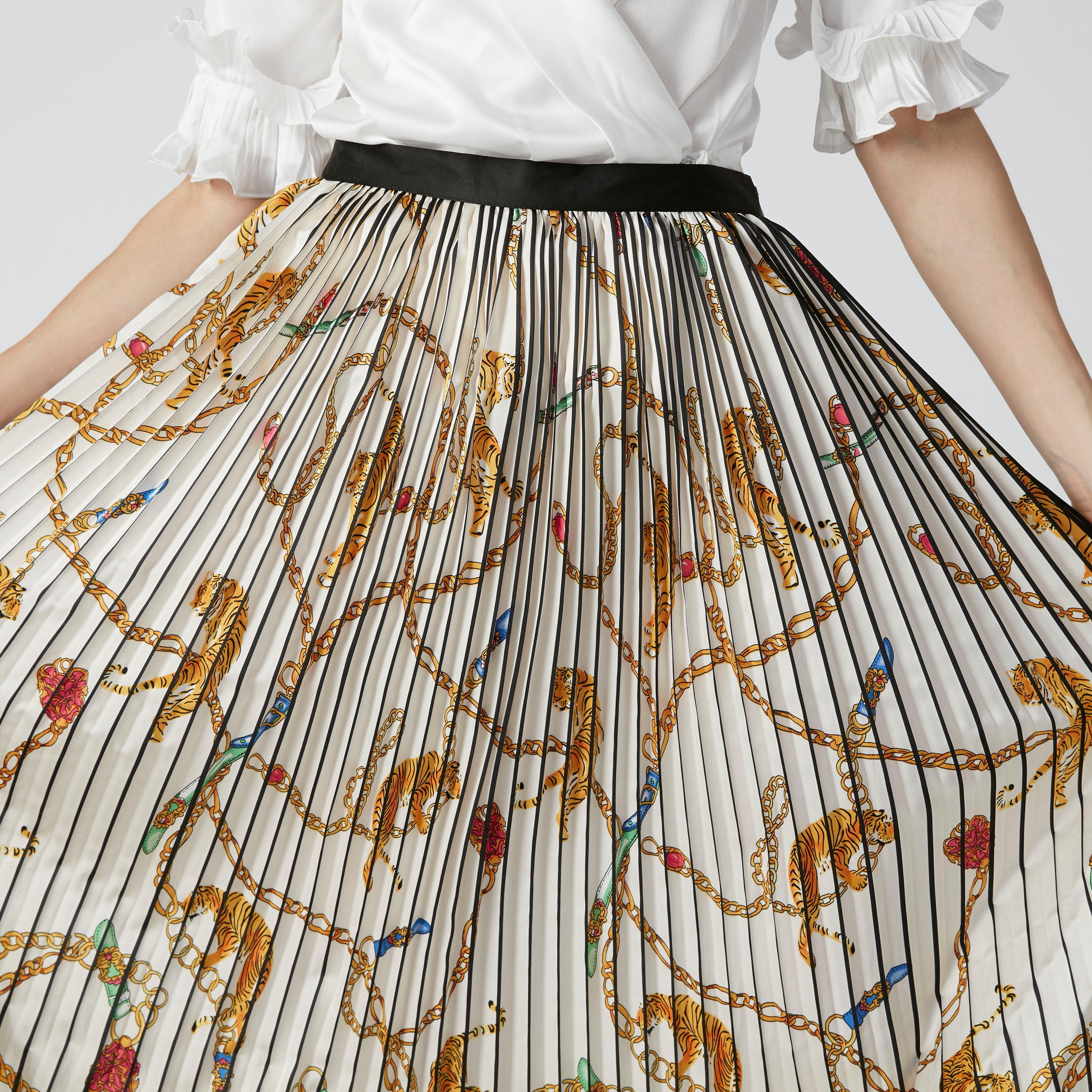 تنورة إيه لاين متوسطة الطول بخصر مطّاطي وثنيات وطبعات من إيل-women-clothing-bottoms-skirts-image-5