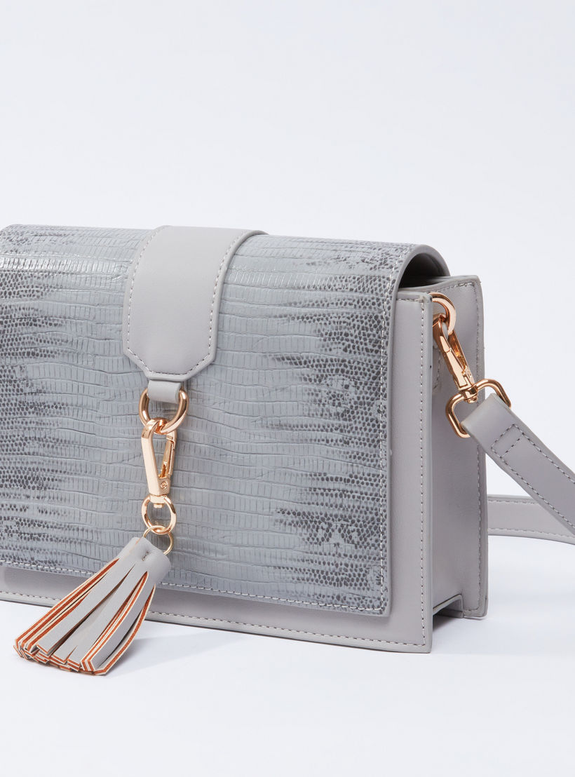 حقيبة ساتشيل بزر إغلاق مغناطيسي وشرّابات وطبعات-women-bagsandwallets-handbags-image-1