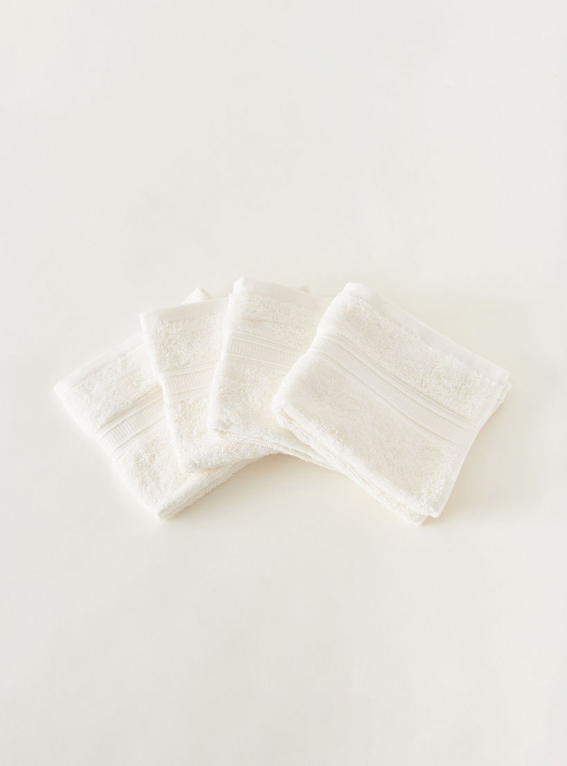 طقم مناشف وجه بارزة الملمس 4 قطع من القطن المصري - 30x30 سم -household-bathandlaundry-bathlinen-towels-image-2