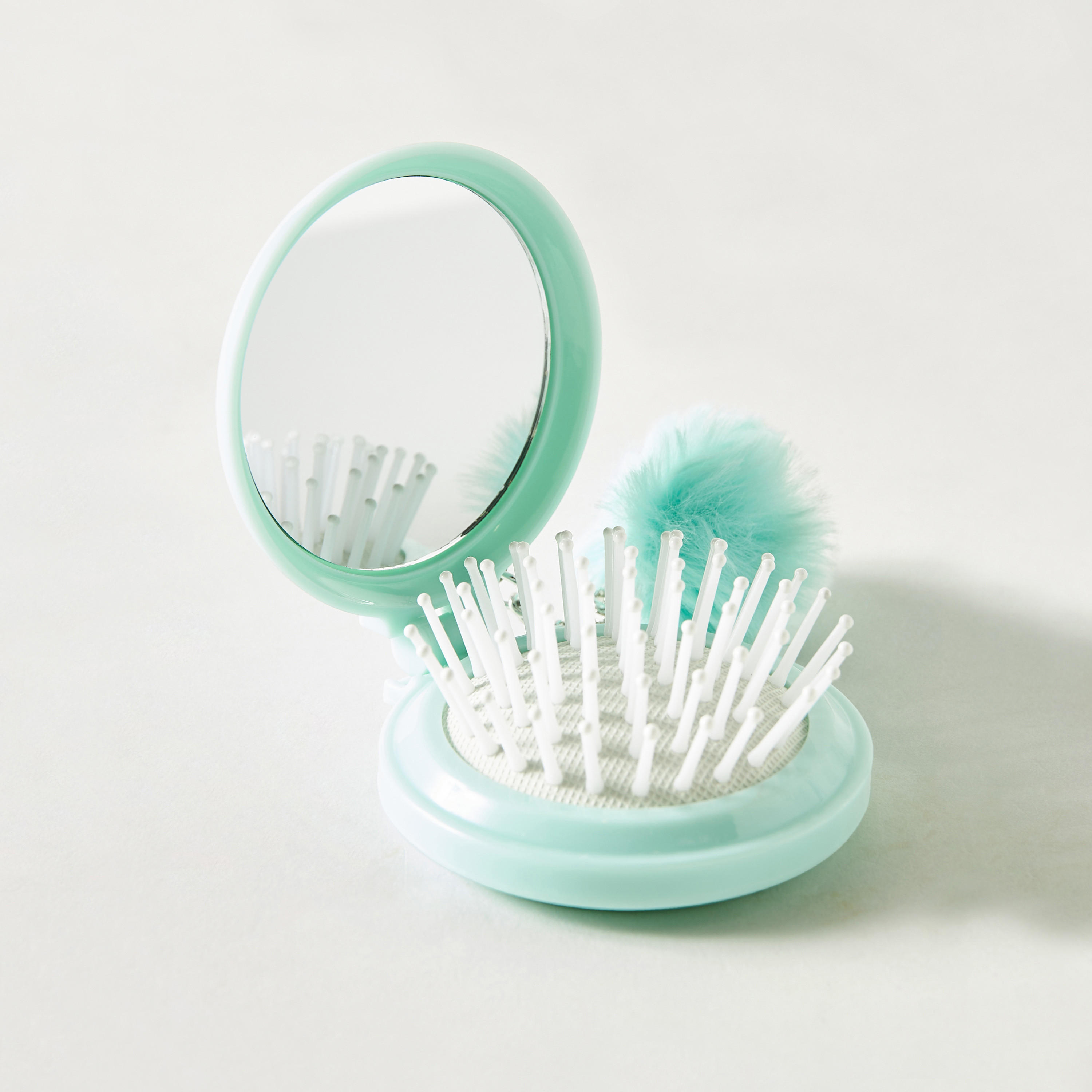 Folded Hairbrush with Mirror and Pom-Pom Detail-beautyandpersonalcare-hair-stylingtools-hairbrushesandcombs-image-1