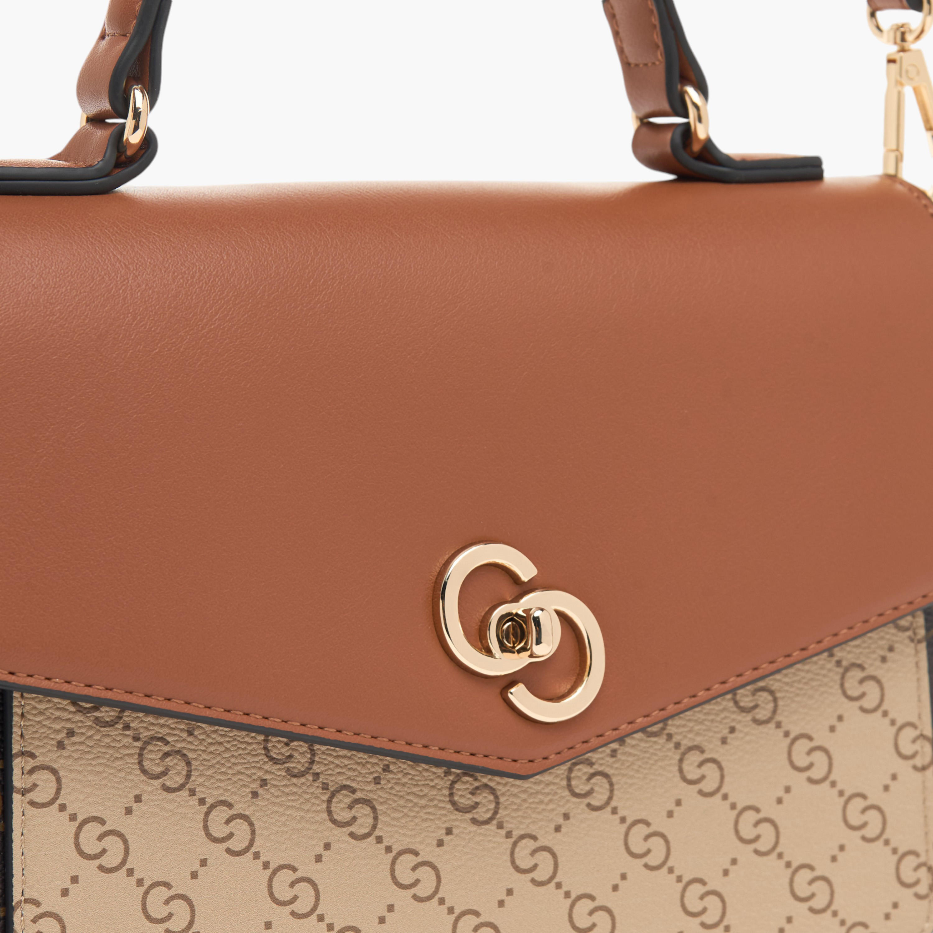شنطة ساتشيل بحزام قابل للفصل وطيّة إغلاق وطبعات مونوجرام من سيليست-women-bagsandwallets-handbags-image-4