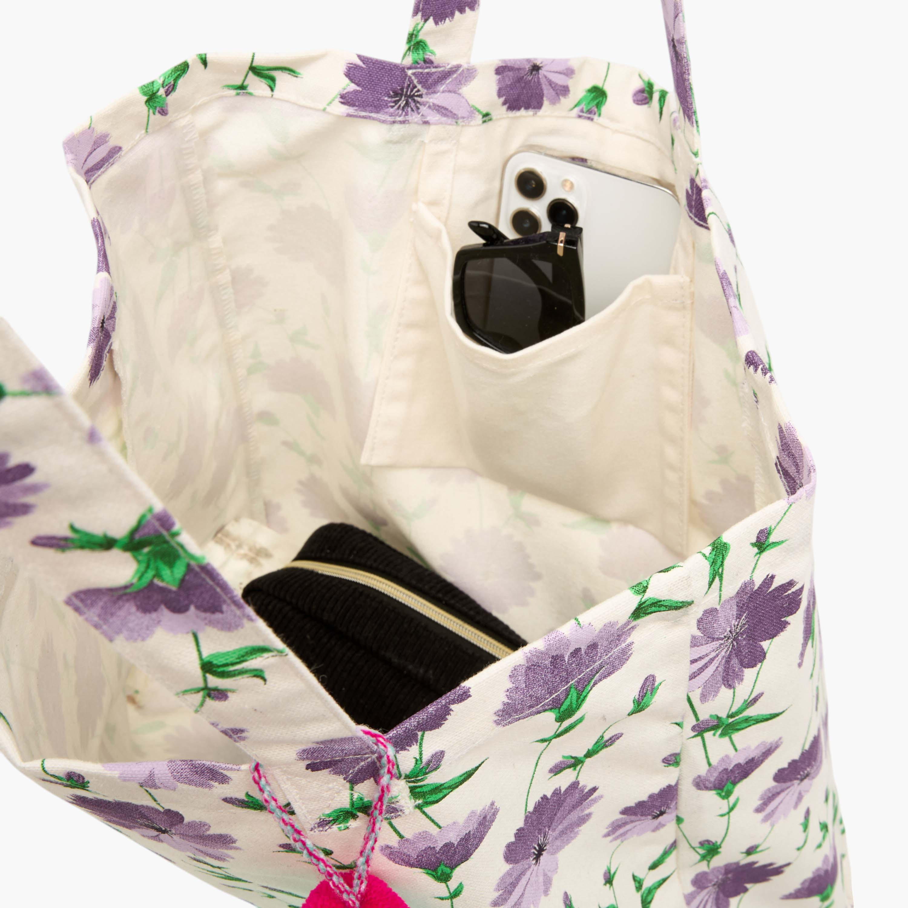 شنطة تسوق بمقابض مزدوجة وشُرّابات وطبعات زهرية-women-bagsandwallets-handbags-image-7