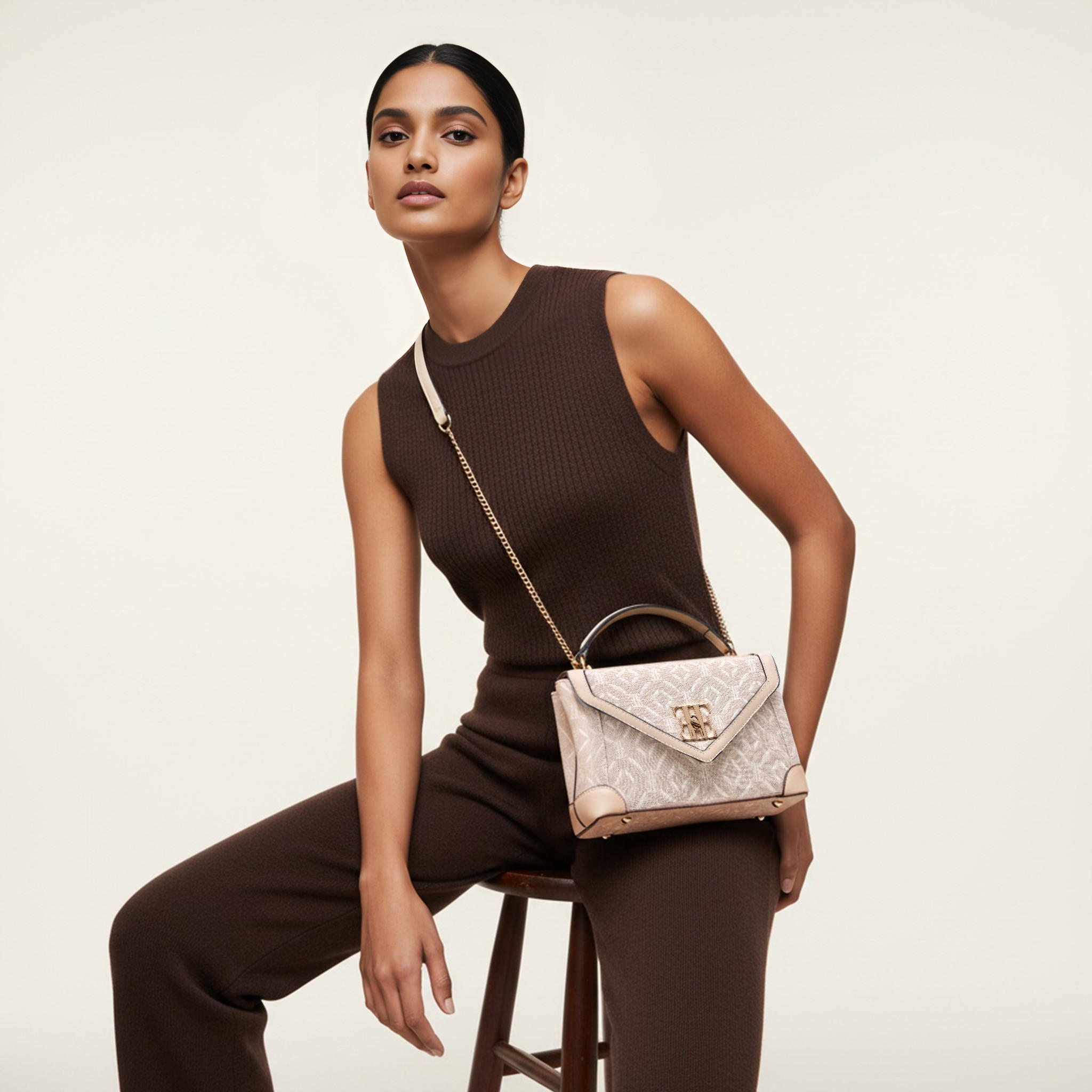 شنطة كروس بودي بشعار بارز الملمس وقفل إغلاق تويست من إيل-women-bagsandwallets-handbags-image-2