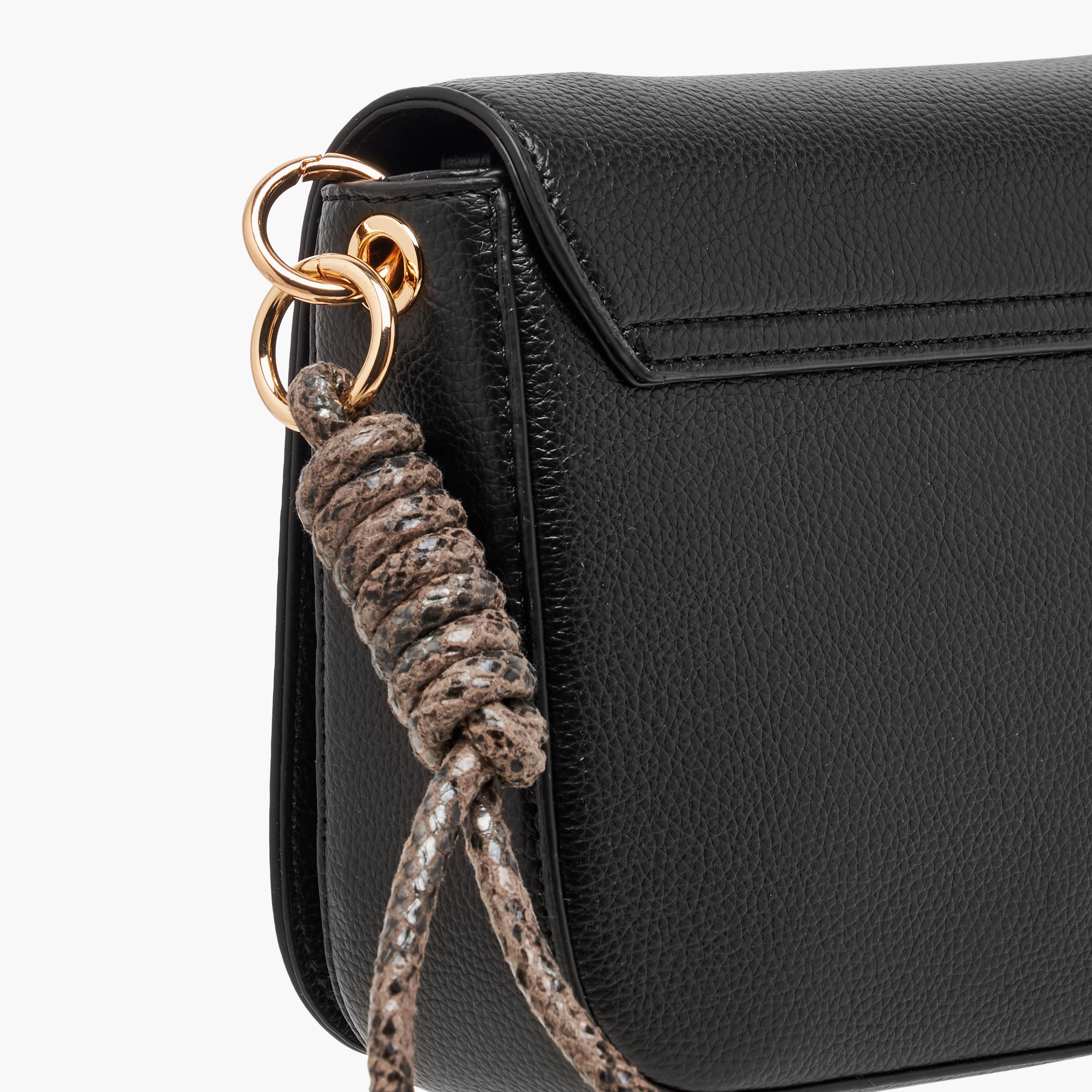 Celeste Solid Crossbody Bag with Adjustable Strap and Button Closure-women-bagsandwallets-handbags-image-6
