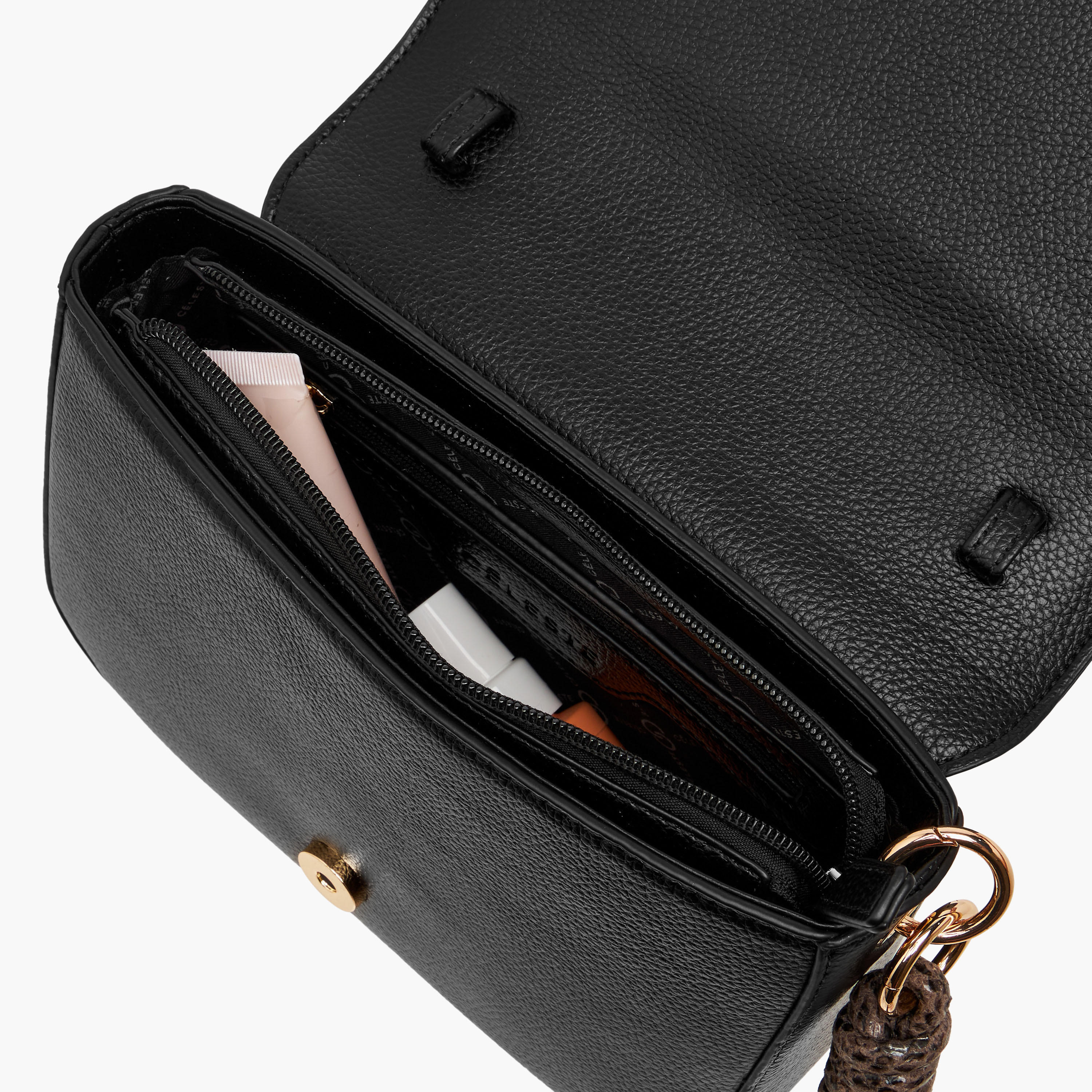 Celeste Solid Crossbody Bag with Adjustable Strap and Button Closure-women-bagsandwallets-handbags-image-9