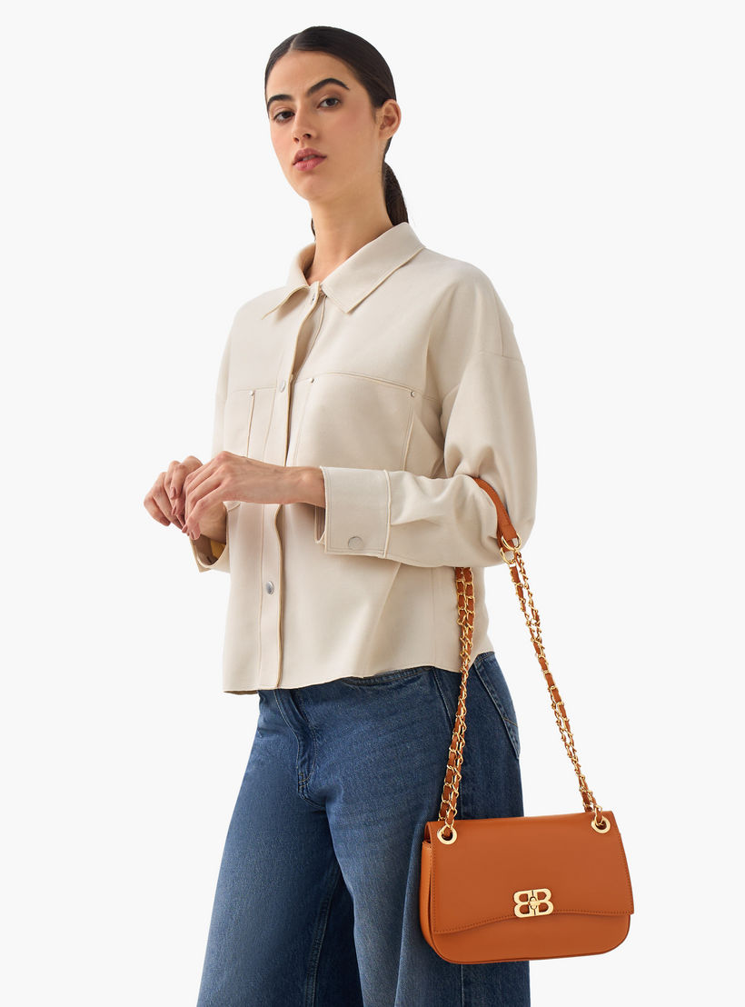 شنطة كروس بودي سادة بقفل تويست من أدور-women-bagsandwallets-handbags-image-2