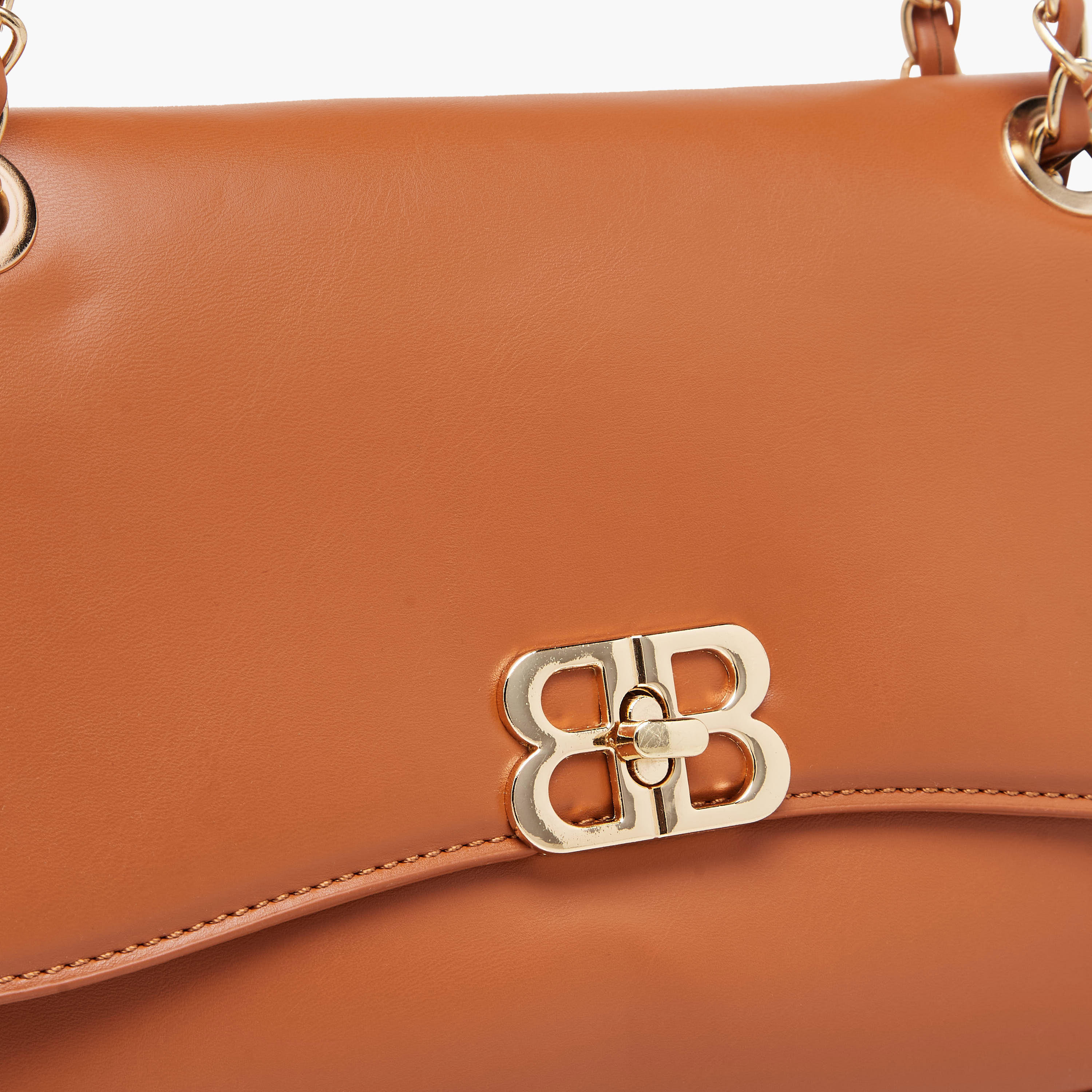 شنطة كروس بودي سادة بقفل تويست من أدور-women-bagsandwallets-handbags-image-5