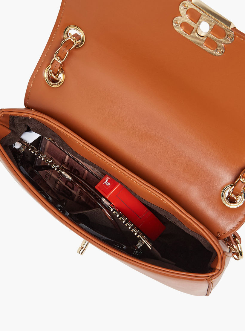 شنطة كروس بودي سادة بقفل تويست من أدور-women-bagsandwallets-handbags-image-9