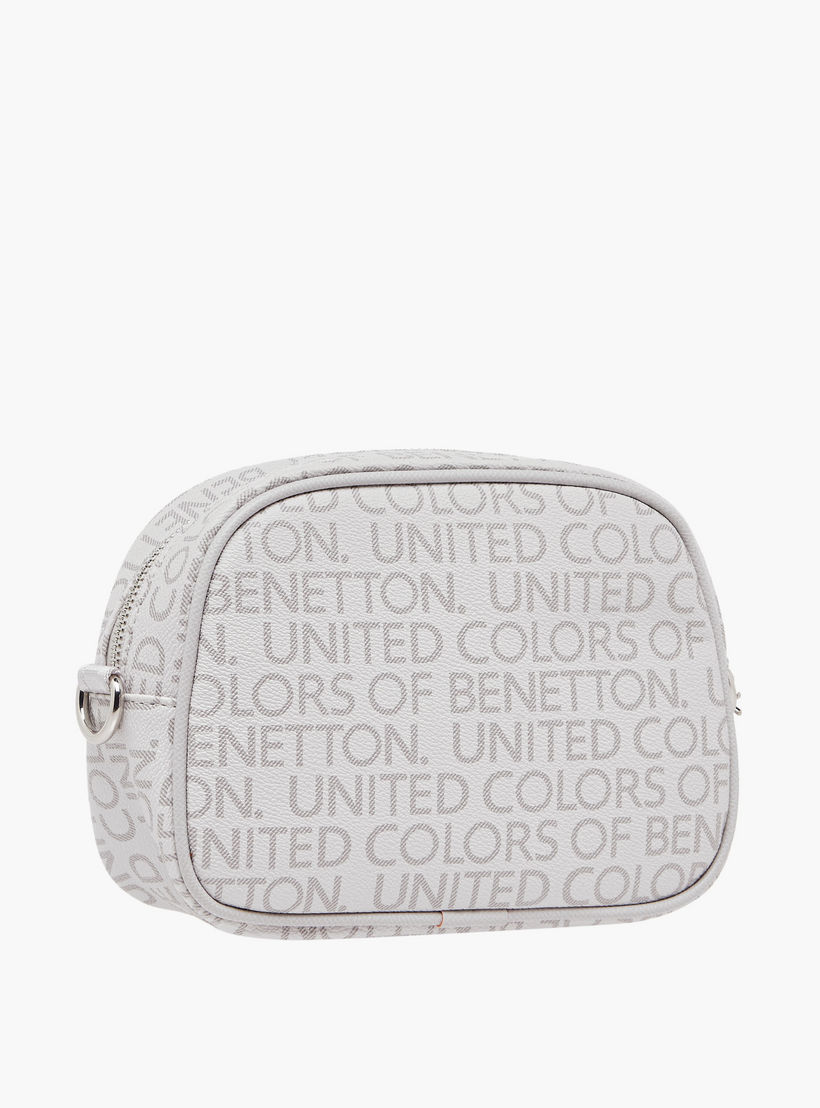 شنطة كروس بودي بحزام قابل للتعديل وطبعات شعار من يو سي بي-women-bagsandwallets-handbags-image-4