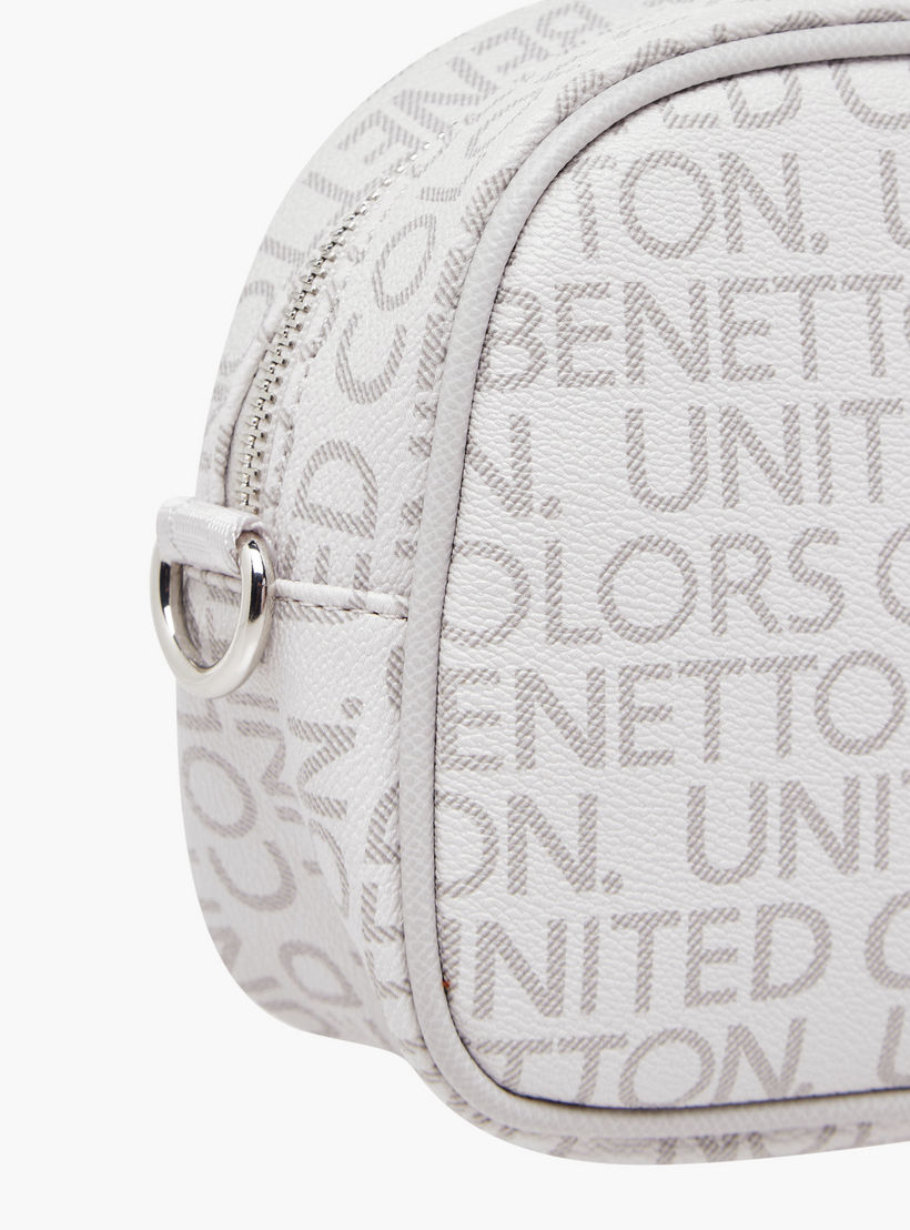 شنطة كروس بودي بحزام قابل للتعديل وطبعات شعار من يو سي بي-women-bagsandwallets-handbags-image-6